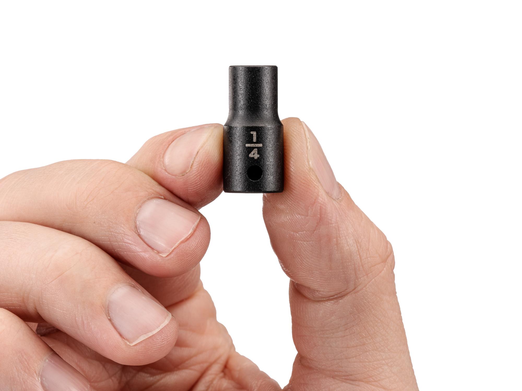 Person holding Tekton impact drive 6-point socket. Item #SID02006