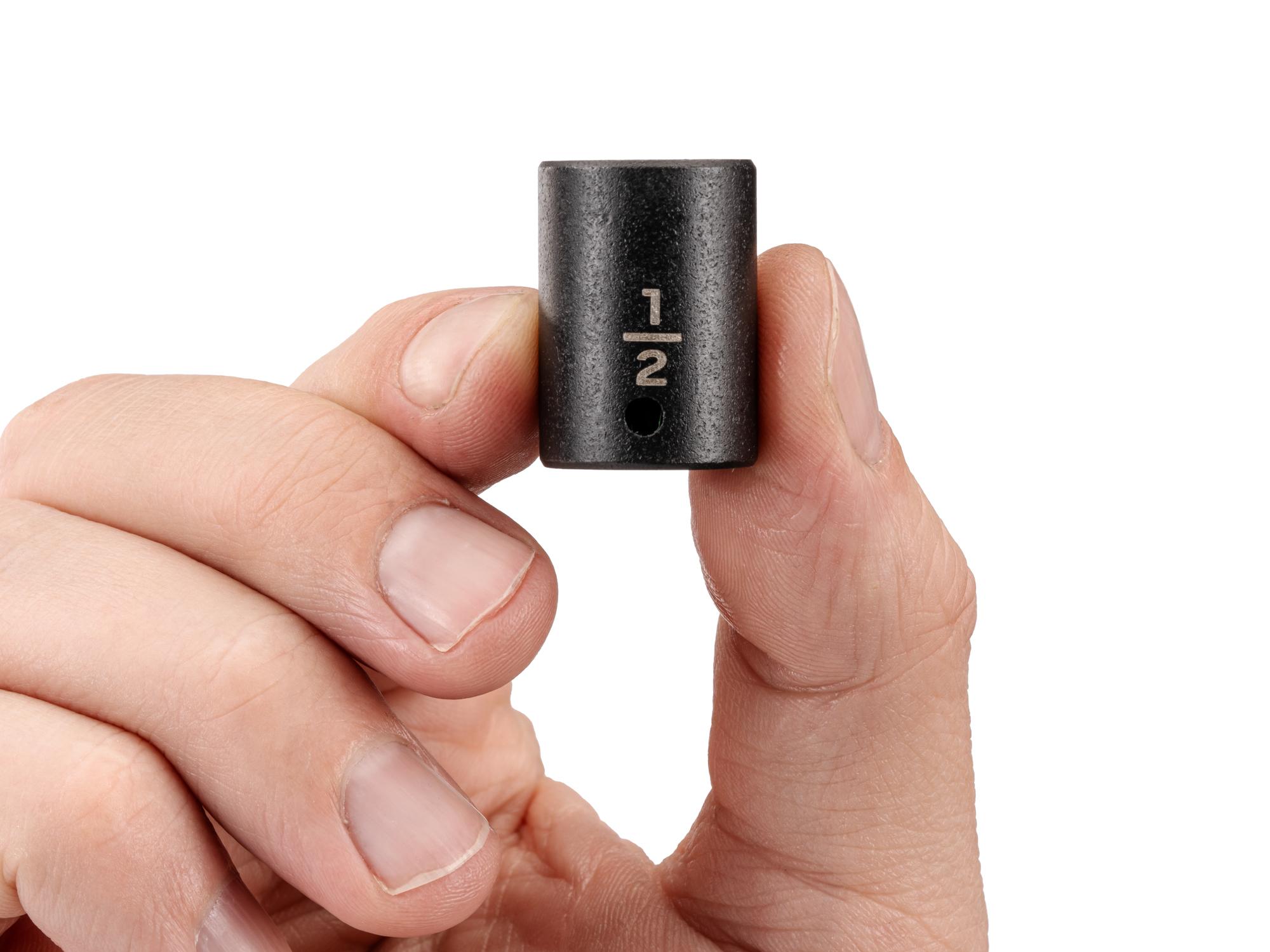 Person holding Tekton impact drive 6-point socket. Item #SID02013
