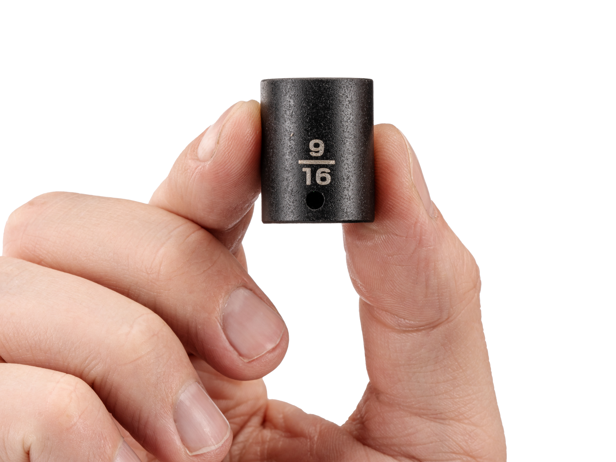 Person holding  Tekton 9/16 inchimpact drive 6-point socket