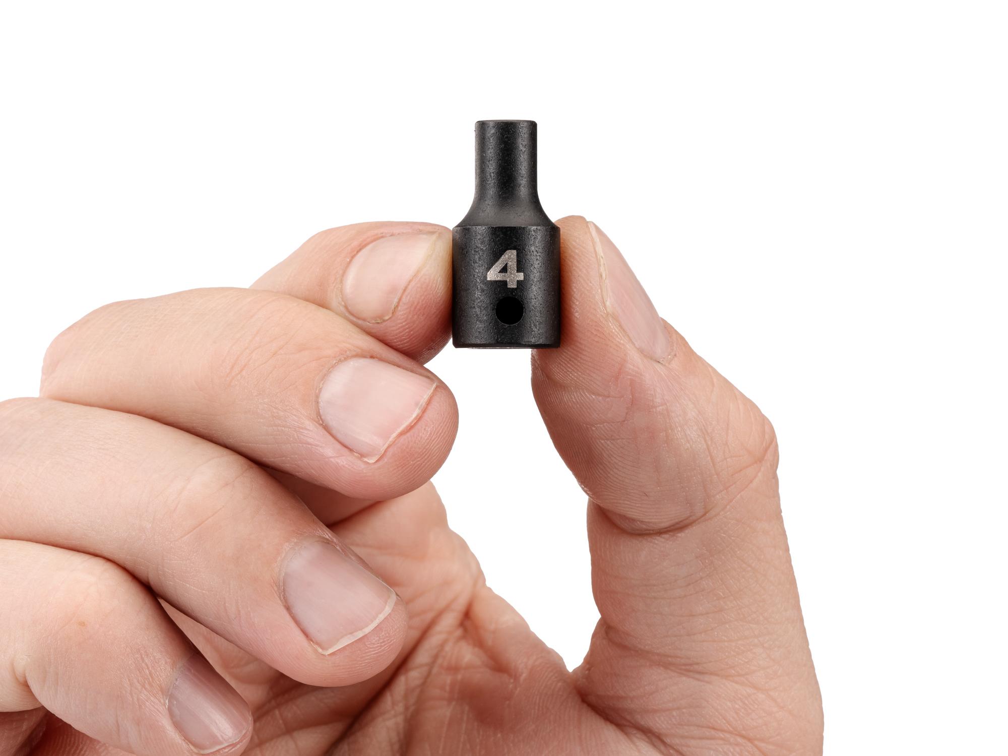 Person holding Tekton impact drive 6-point socket. Item #SID02102
