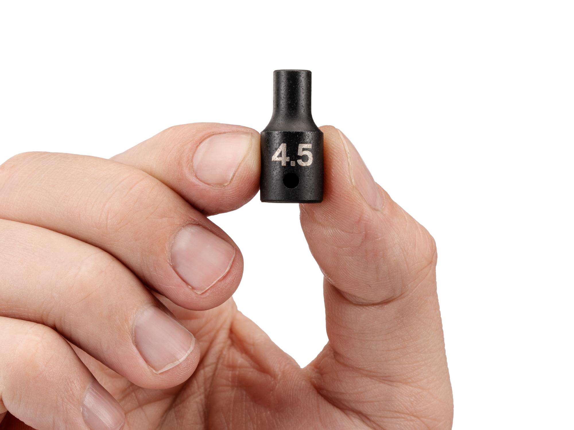 Person holding Tekton impact drive 6-point socket. Item #SID02103