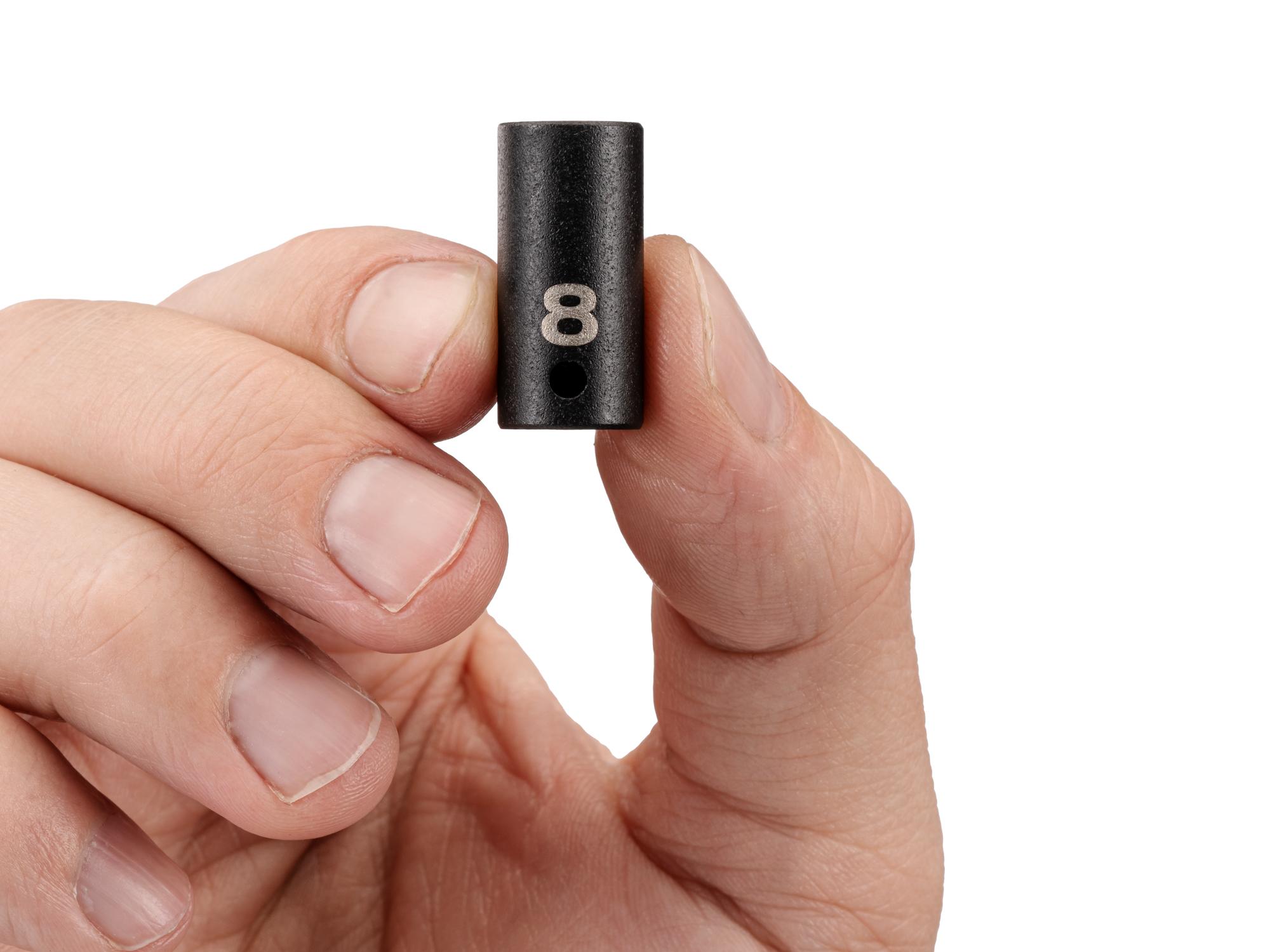 Person holding Tekton impact drive 6-point socket. Item #SID02108