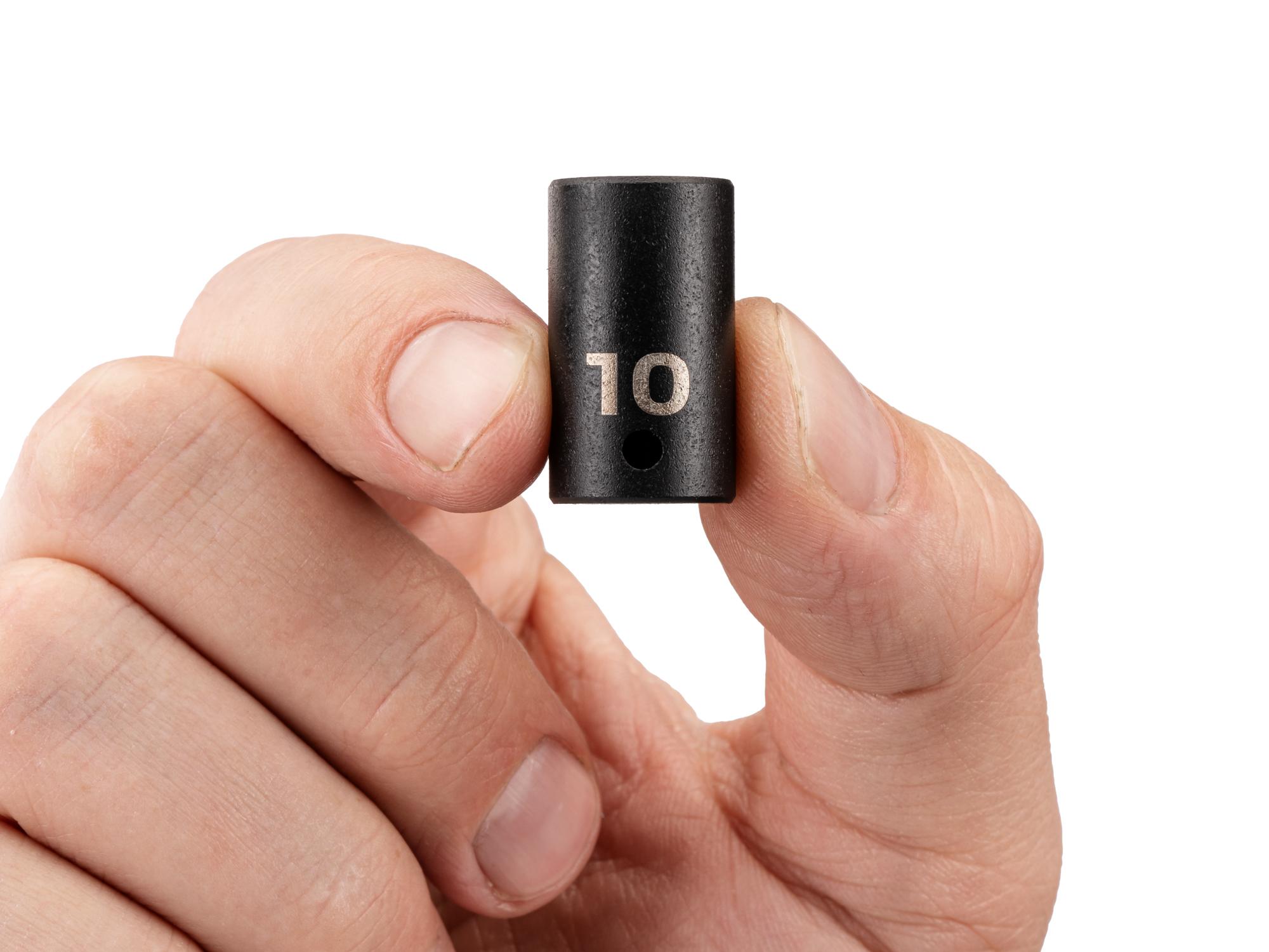 Person holding Tekton impact drive 6-point socket. Item #SID02110
