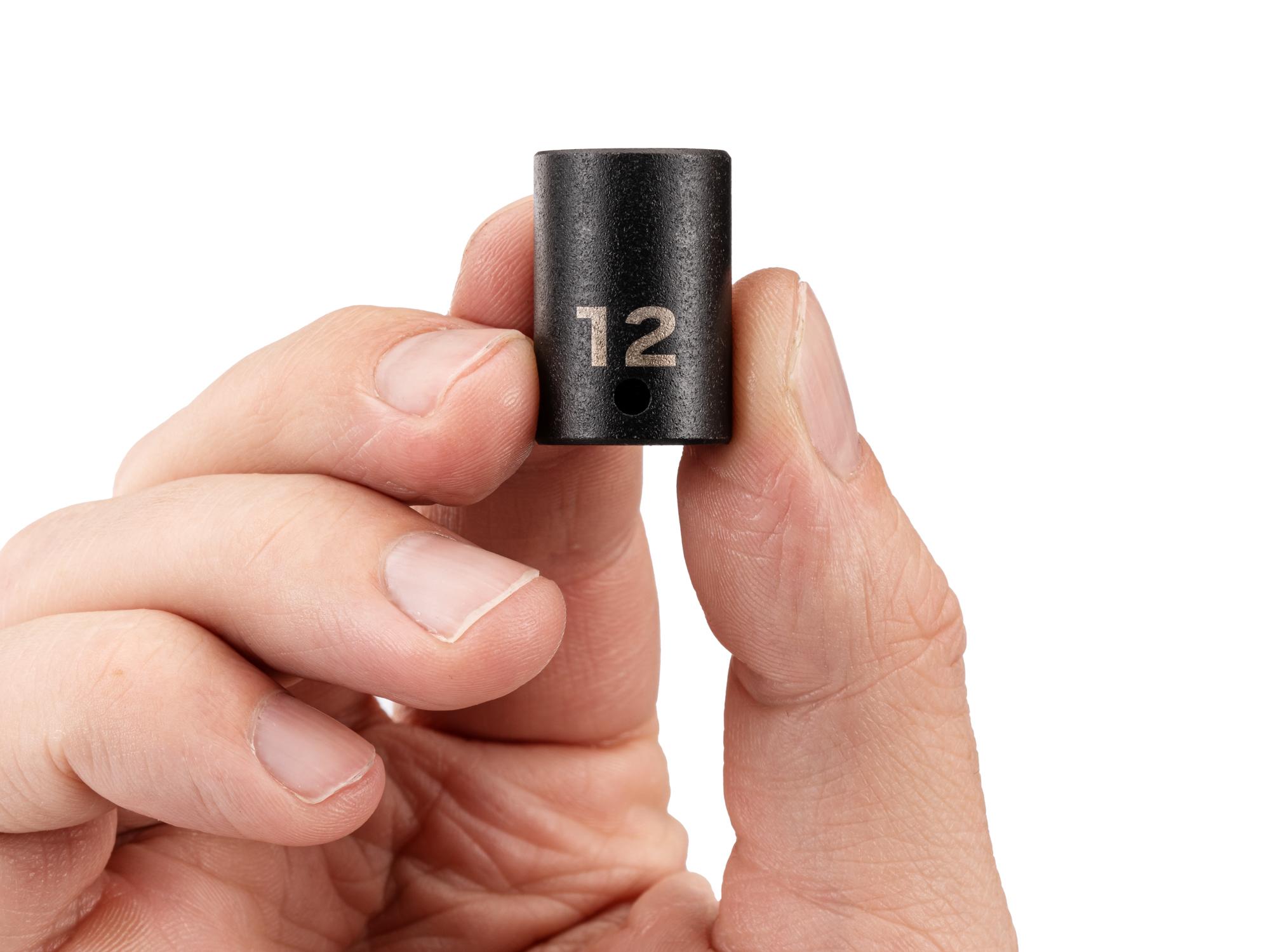 Person holding Tekton impact drive 6-point socket. Item #SID02112