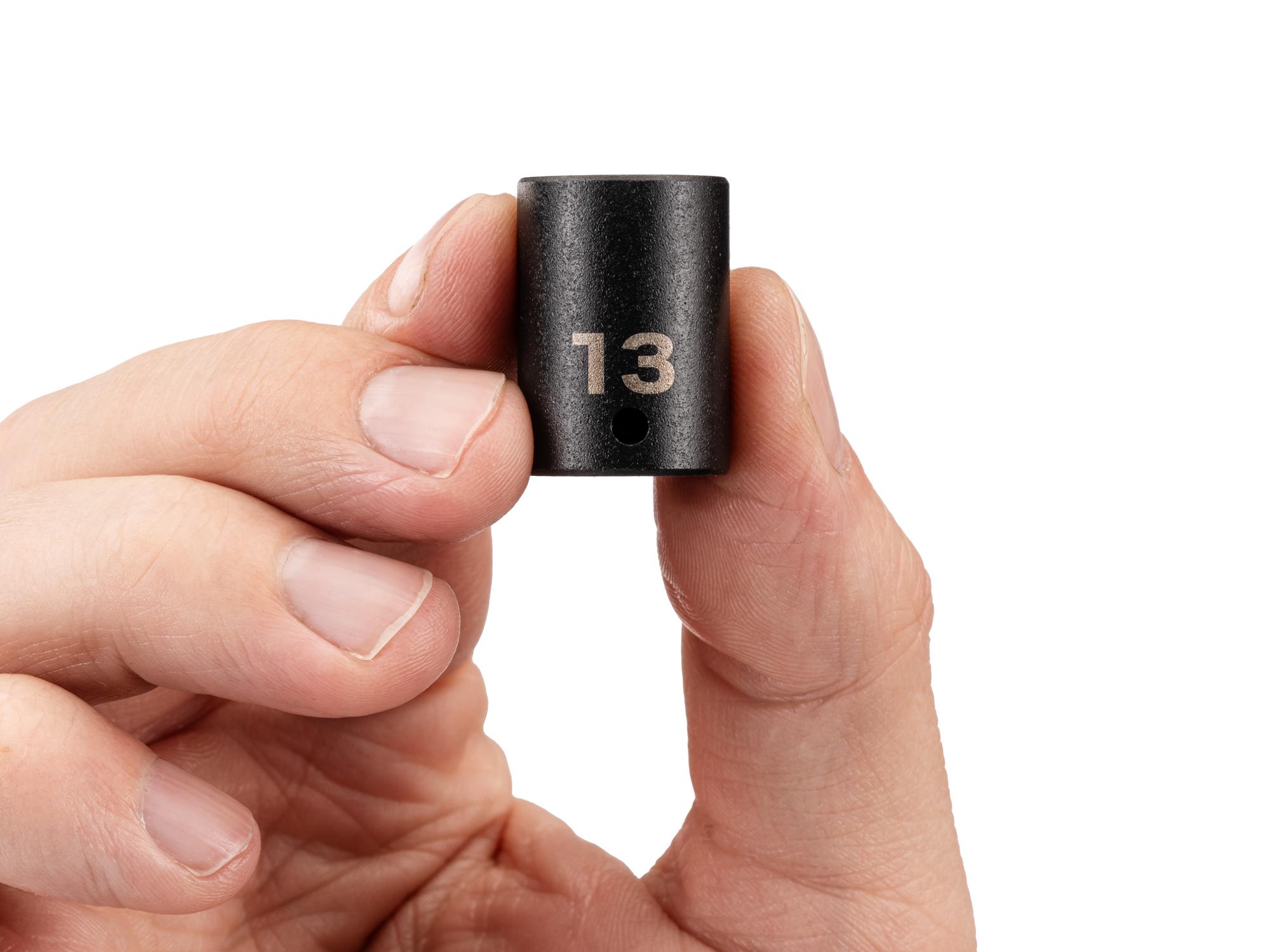 Person holding Tekton impact drive 6-point socket. Item #SID02113