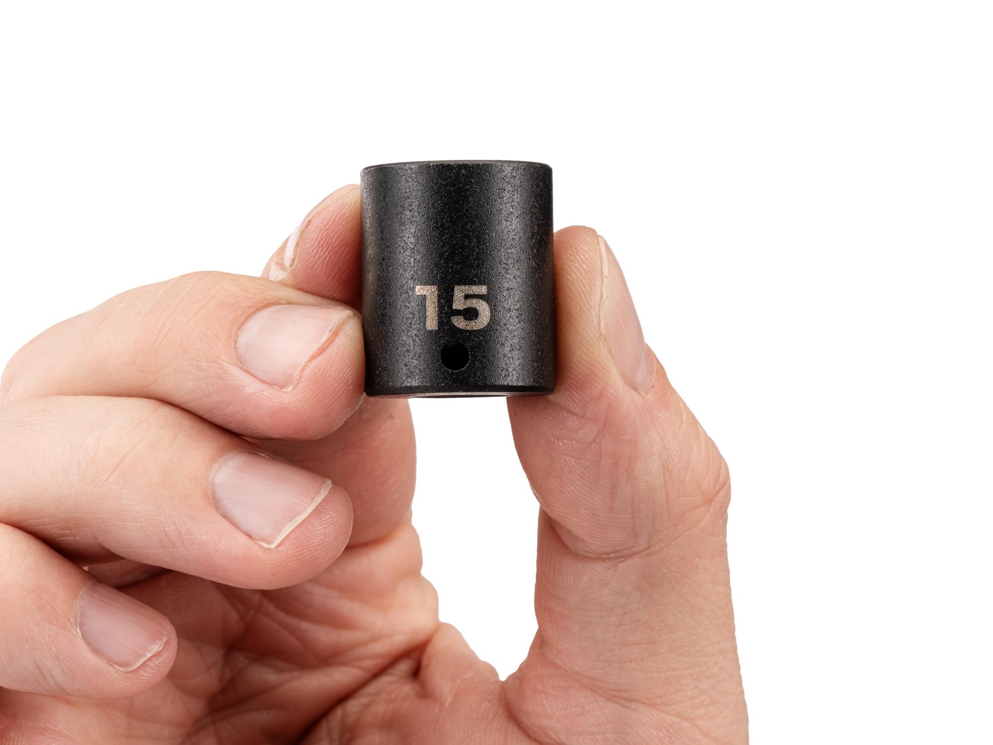 Person holding Tekton impact drive 6-point socket. Item #SID02115