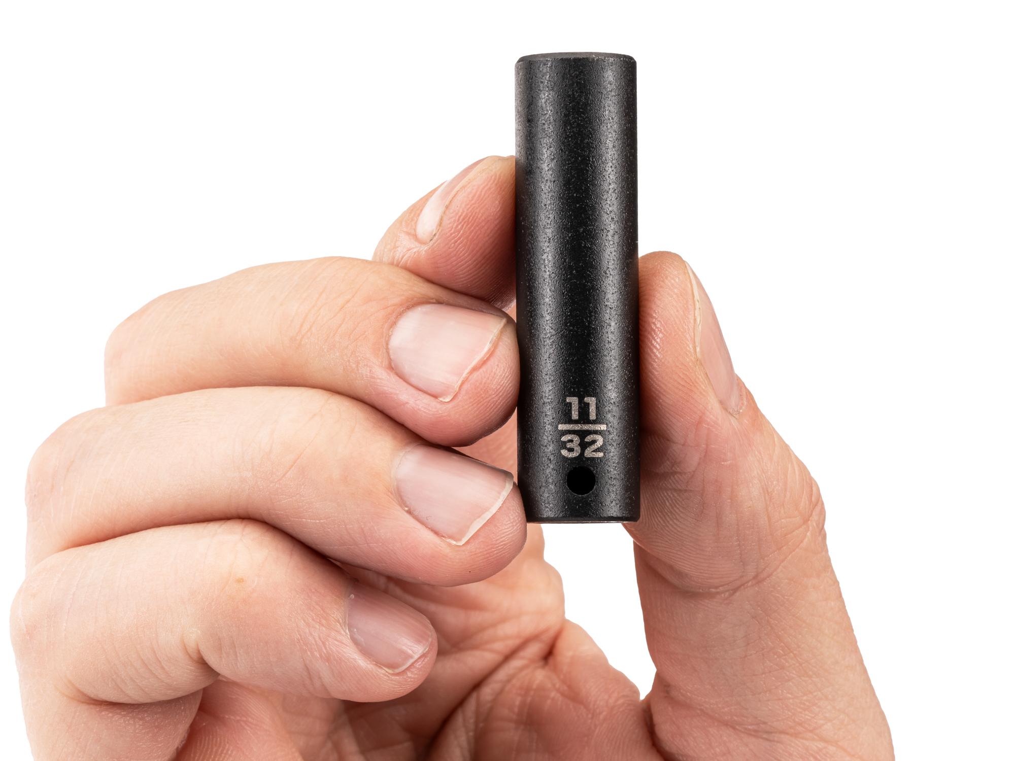 Person holding Tekton impact drive 6-point socket. Item #SID03009