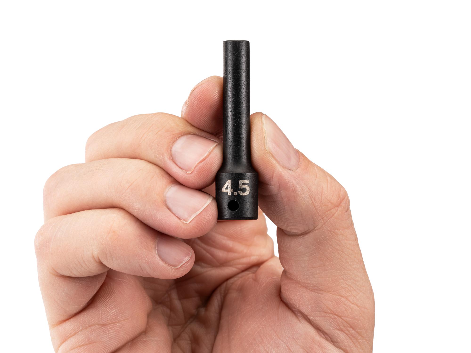 Person holding Tekton impact drive 6-point socket. Item #SID03103