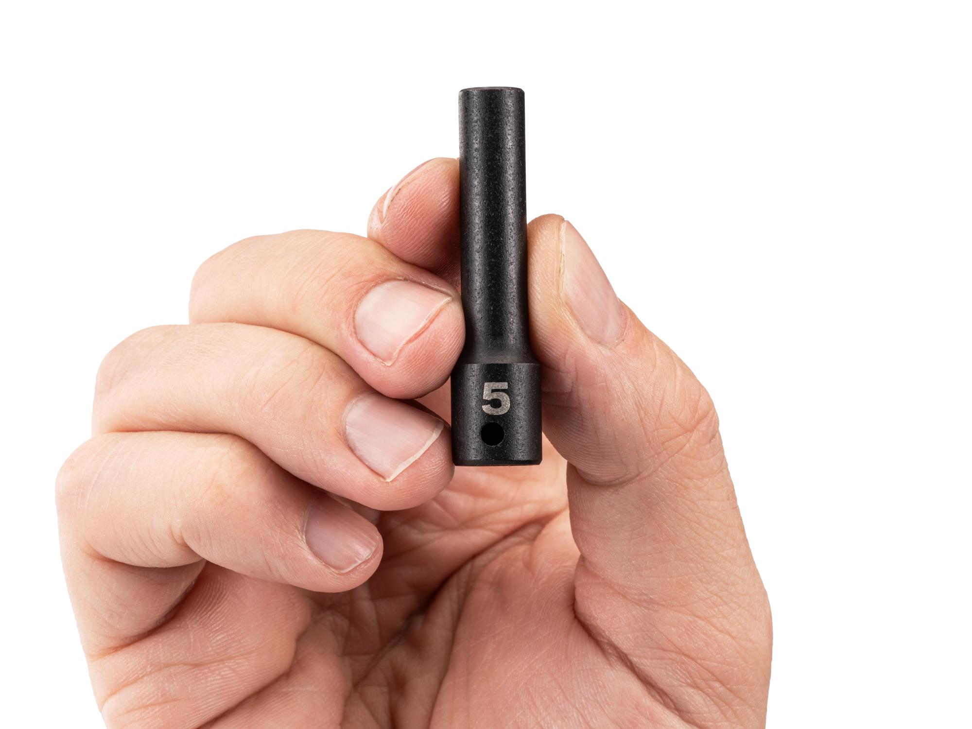 Person holding Tekton impact drive 6-point socket. Item #SID03104