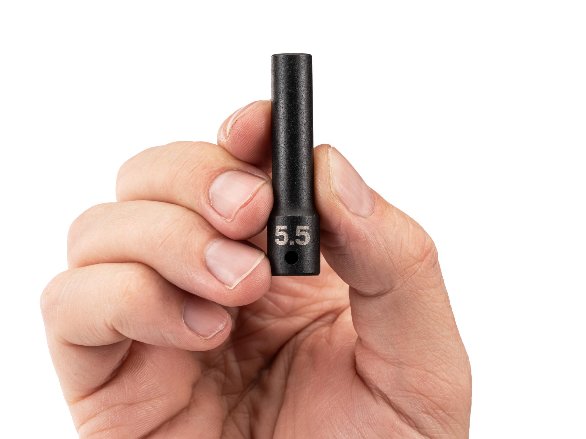 Person holding Tekton impact drive 6-point socket. Item #SID03105