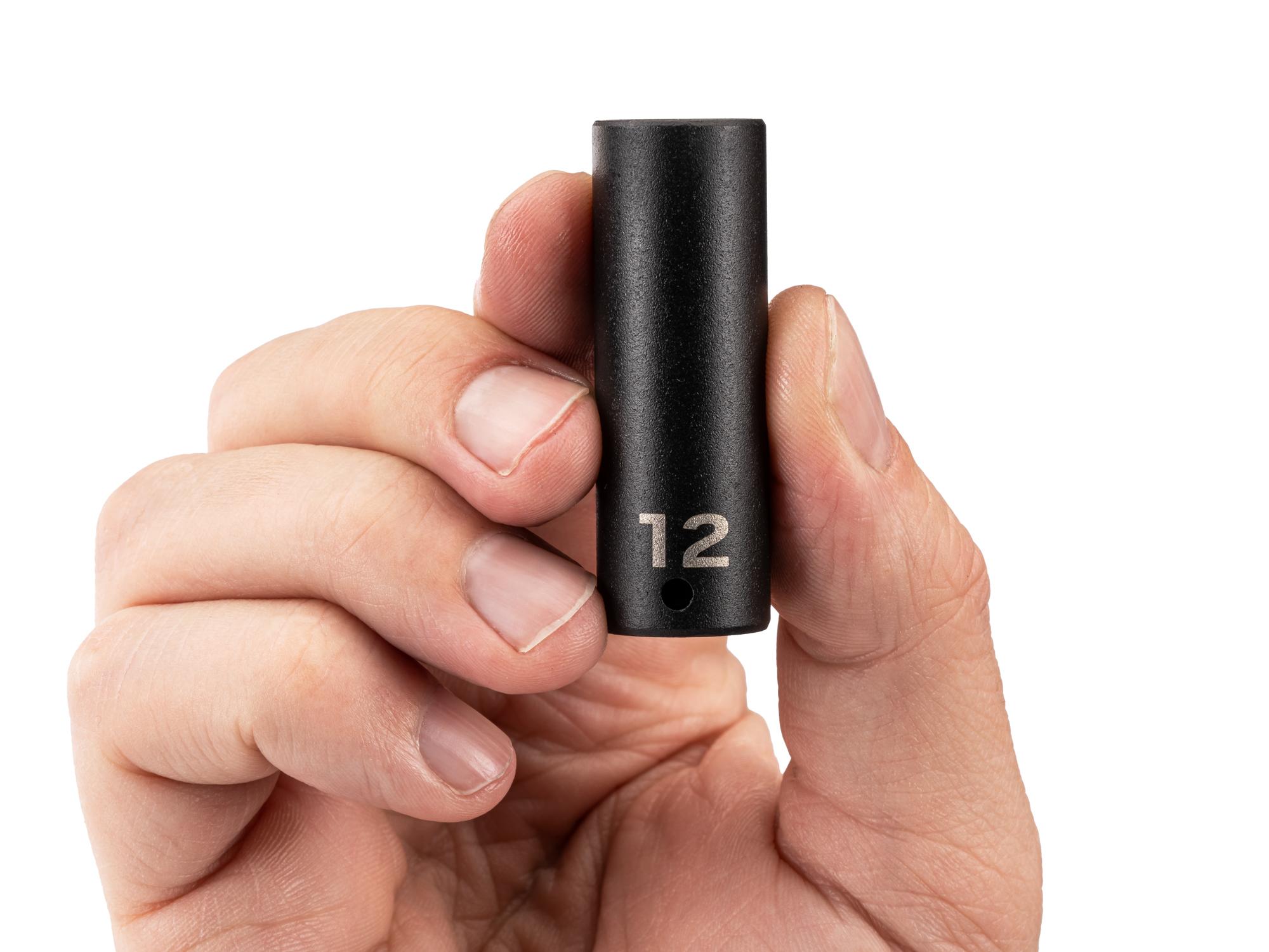 Person holding Tekton impact drive 6-point socket. Item #SID03112