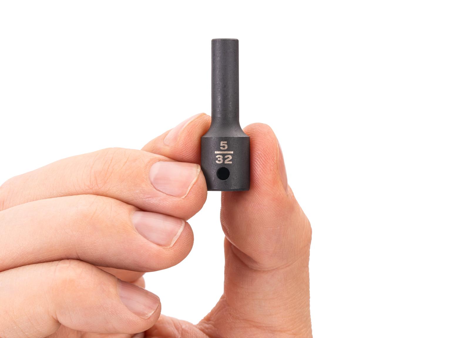 Person holding Tekton impact drive 6-point socket. Item #SID04002