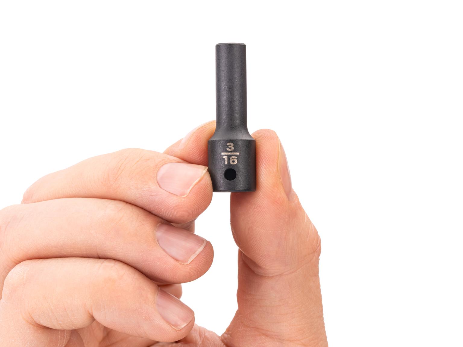 Person holding Tekton impact drive 6-point socket. Item #SID04003