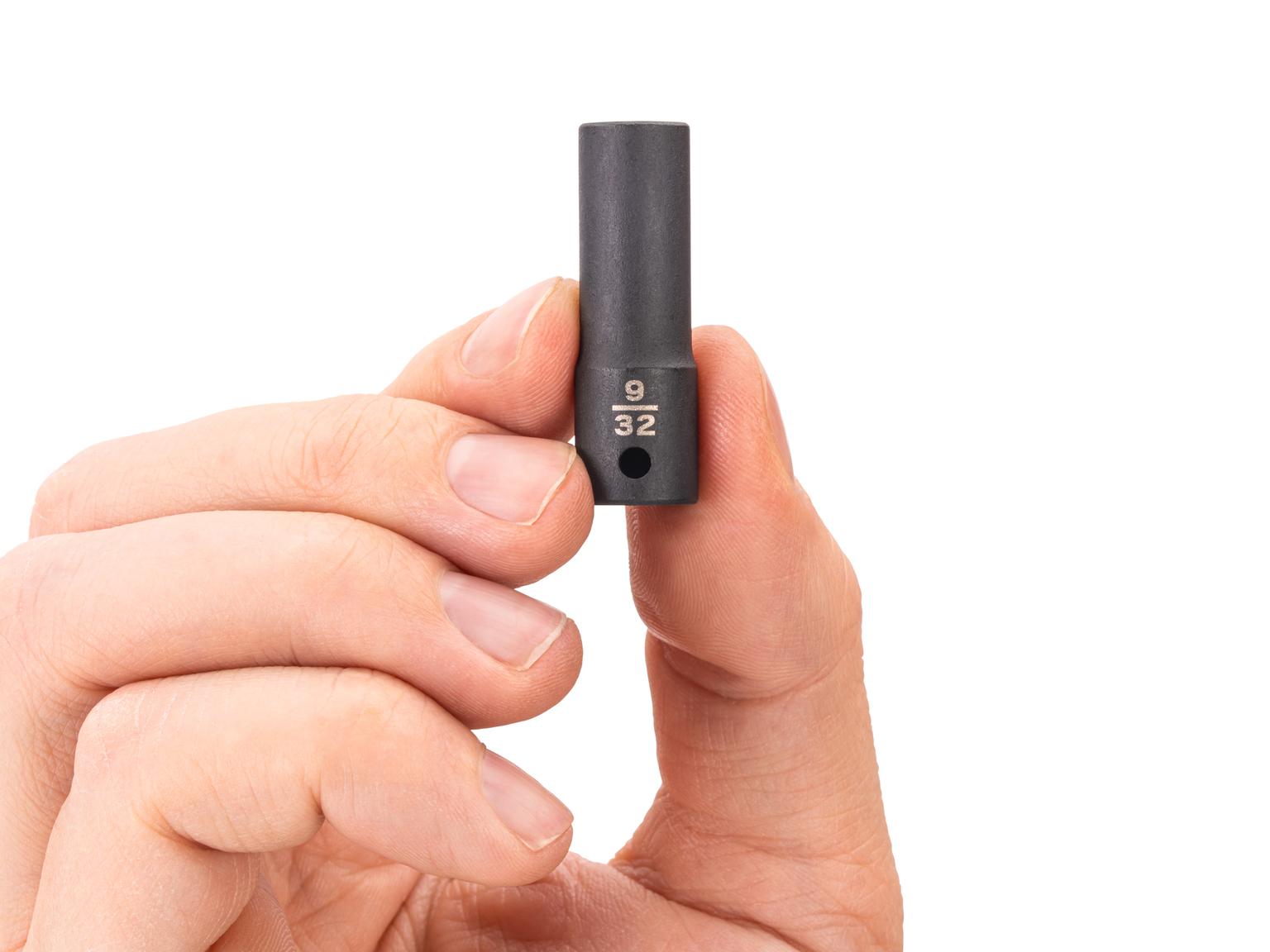 Person holding Tekton impact drive 6-point socket. Item #SID04007