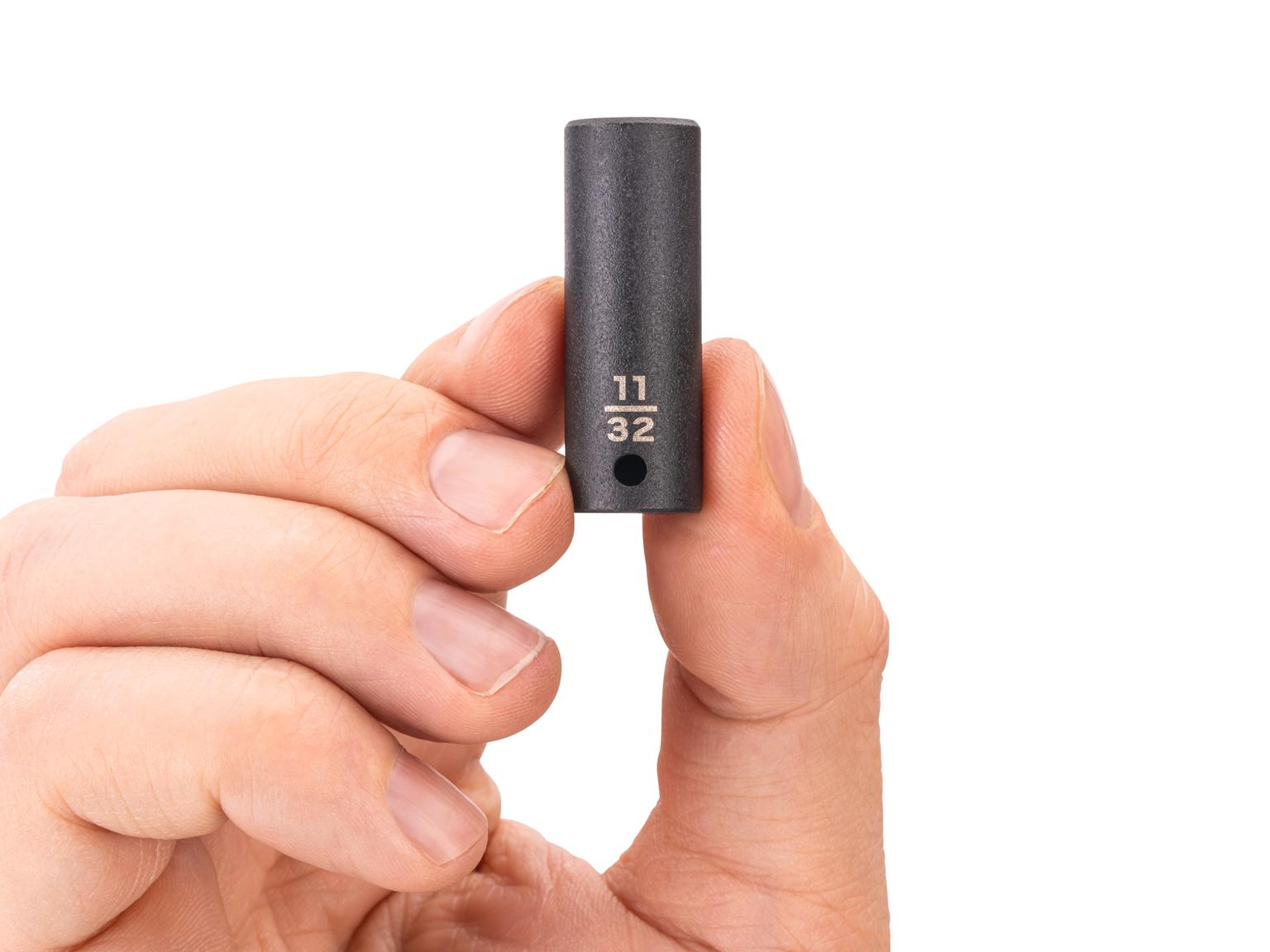 Person holding Tekton impact drive 6-point socket. Item #SID04009