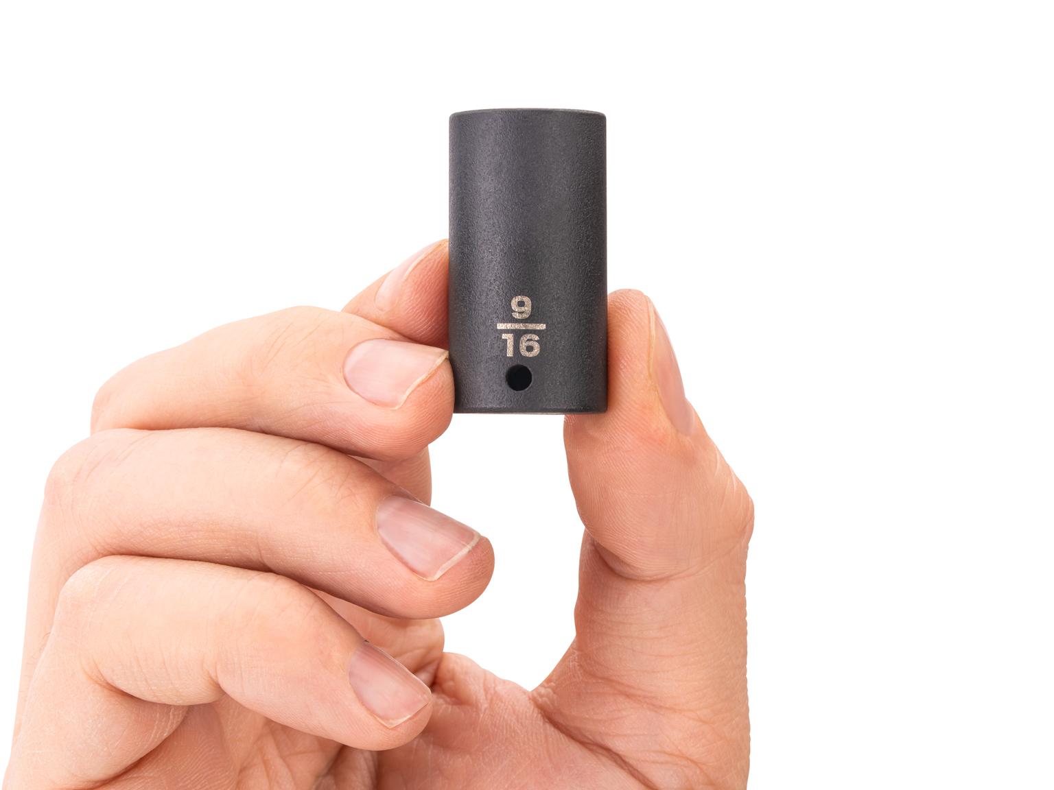 Person holding Tekton impact drive 6-point socket. Item #SID04014