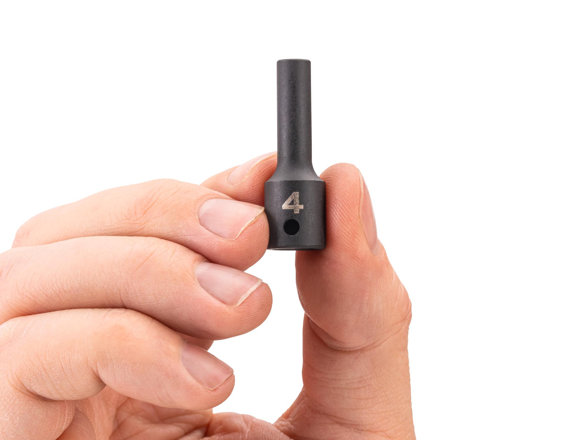 Person holding Tekton impact drive 6-point socket. Item #SID04102