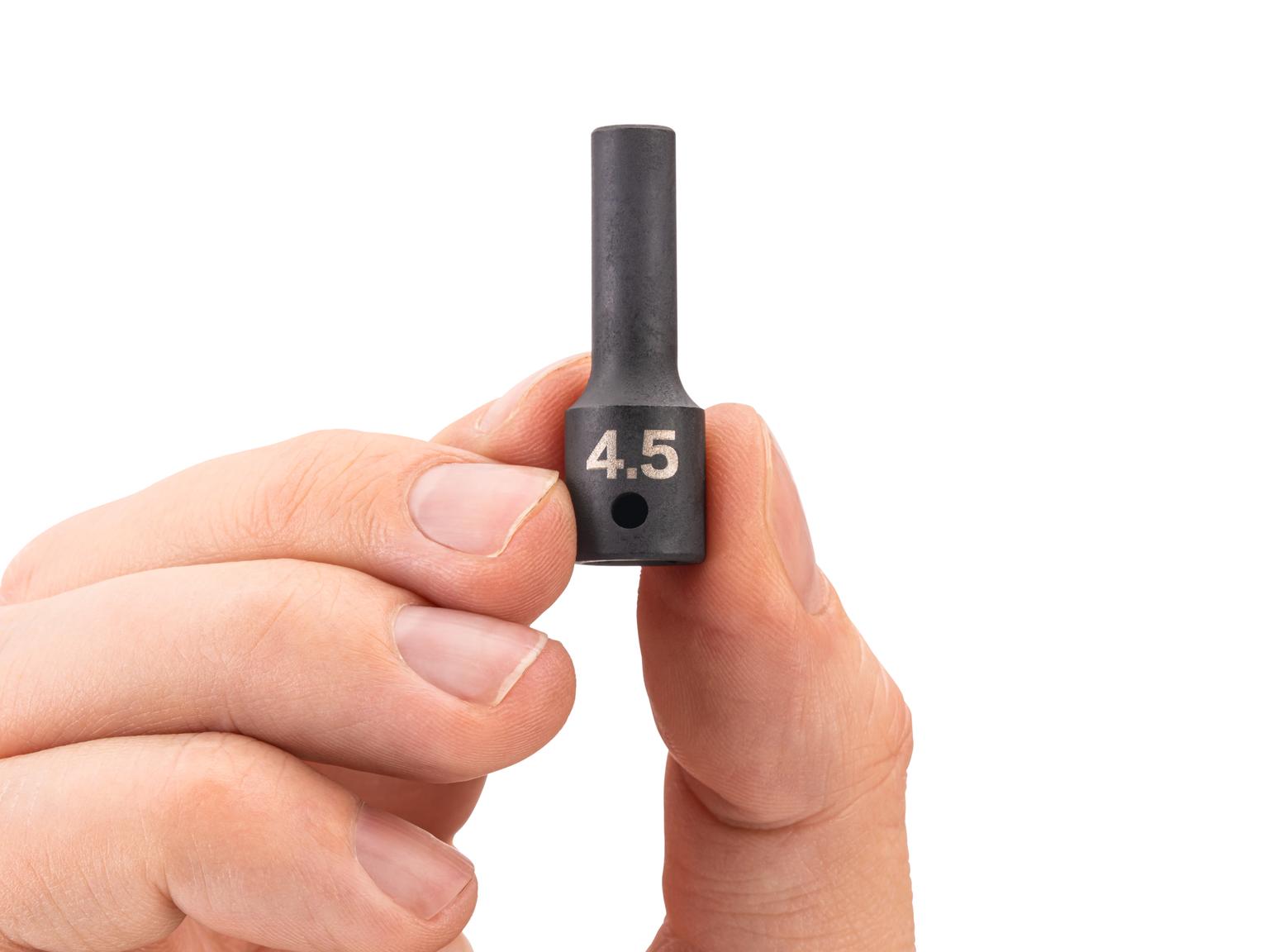 Person holding Tekton impact drive 6-point socket. Item #SID04103