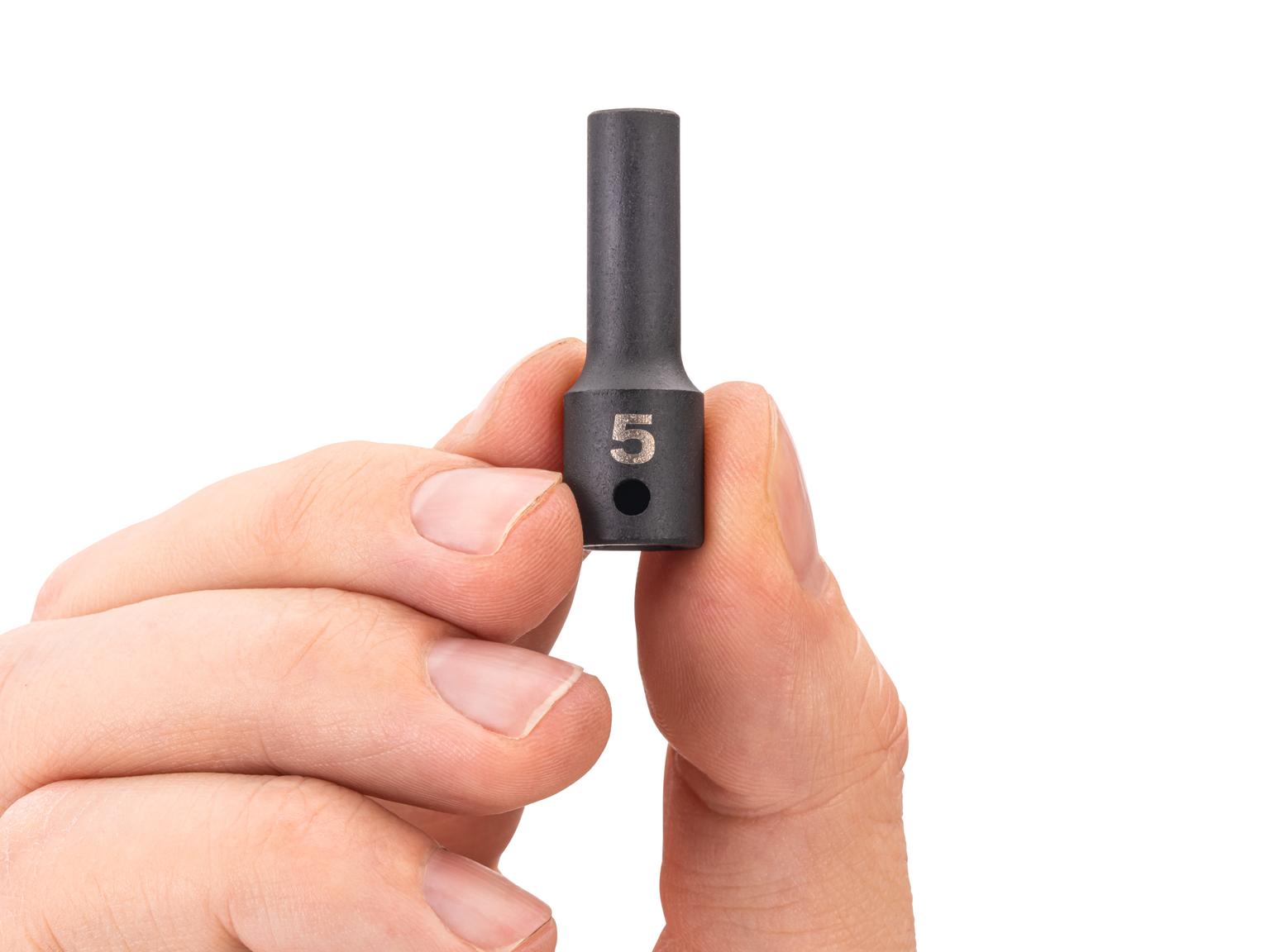 Person holding Tekton impact drive 6-point socket. Item #SID04104