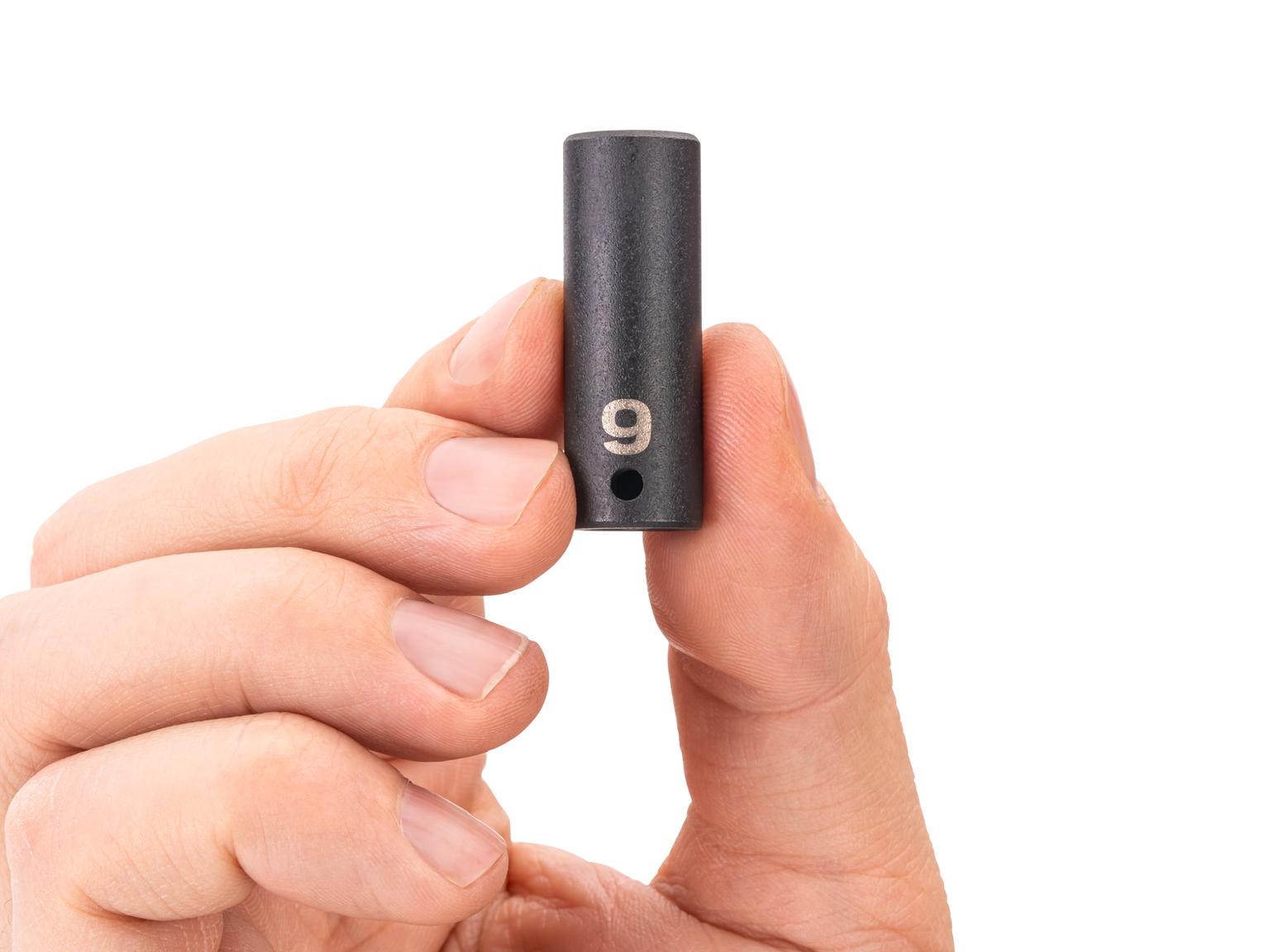 Person holding Tekton impact drive 6-point socket. Item #SID04109