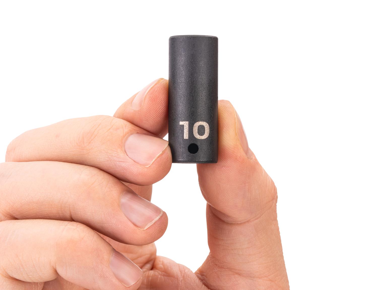 Person holding Tekton impact drive 6-point socket. Item #SID04110