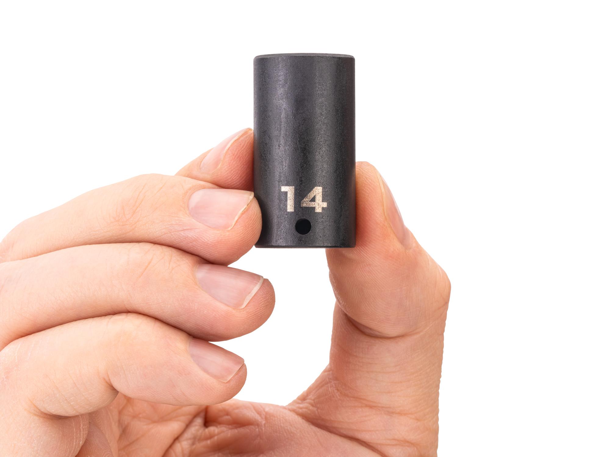 Person holding Tekton impact drive 6-point socket. Item #SID04114