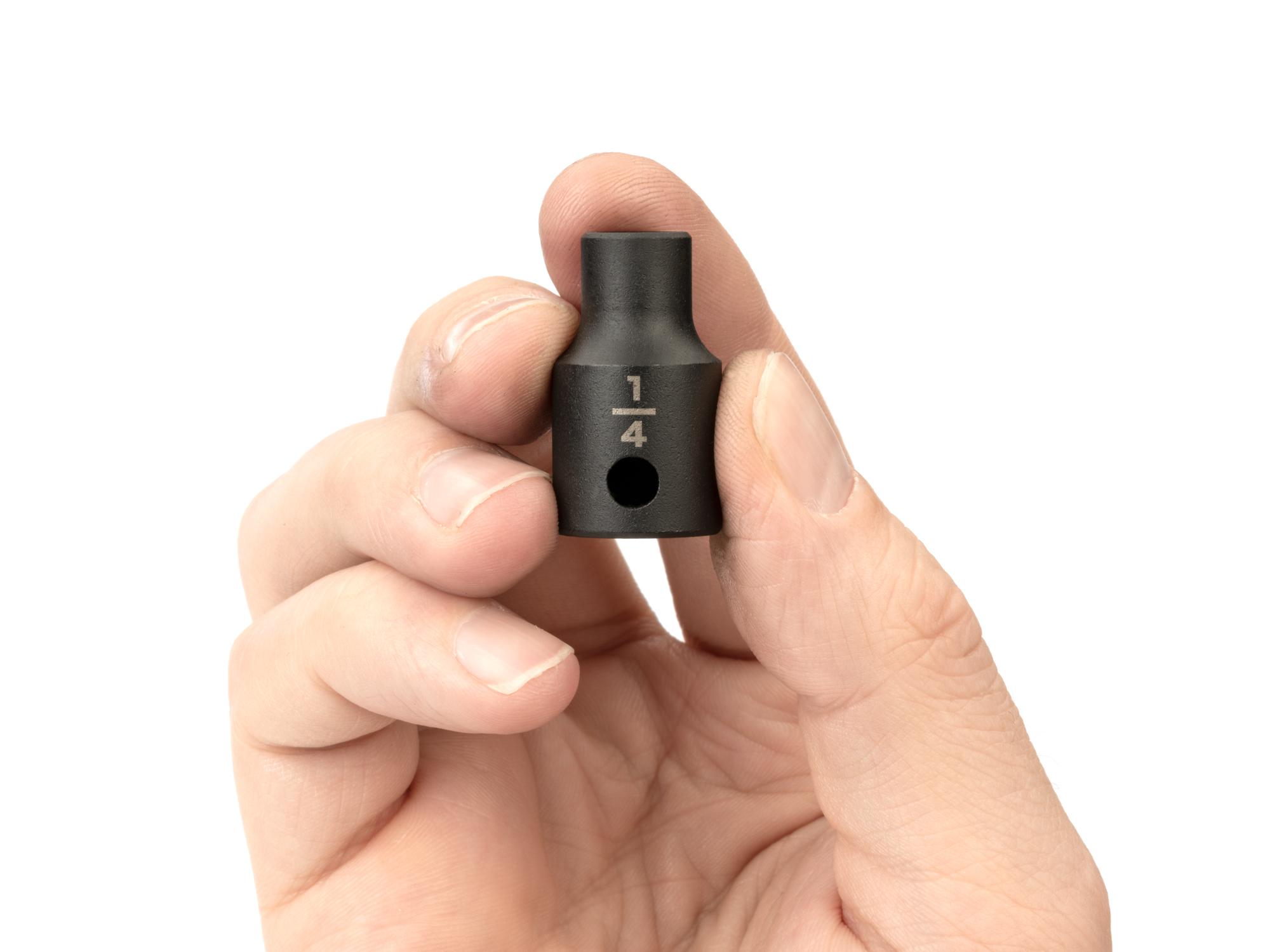 Person holding Tekton impact drive 6-point socket. Item #SID12006