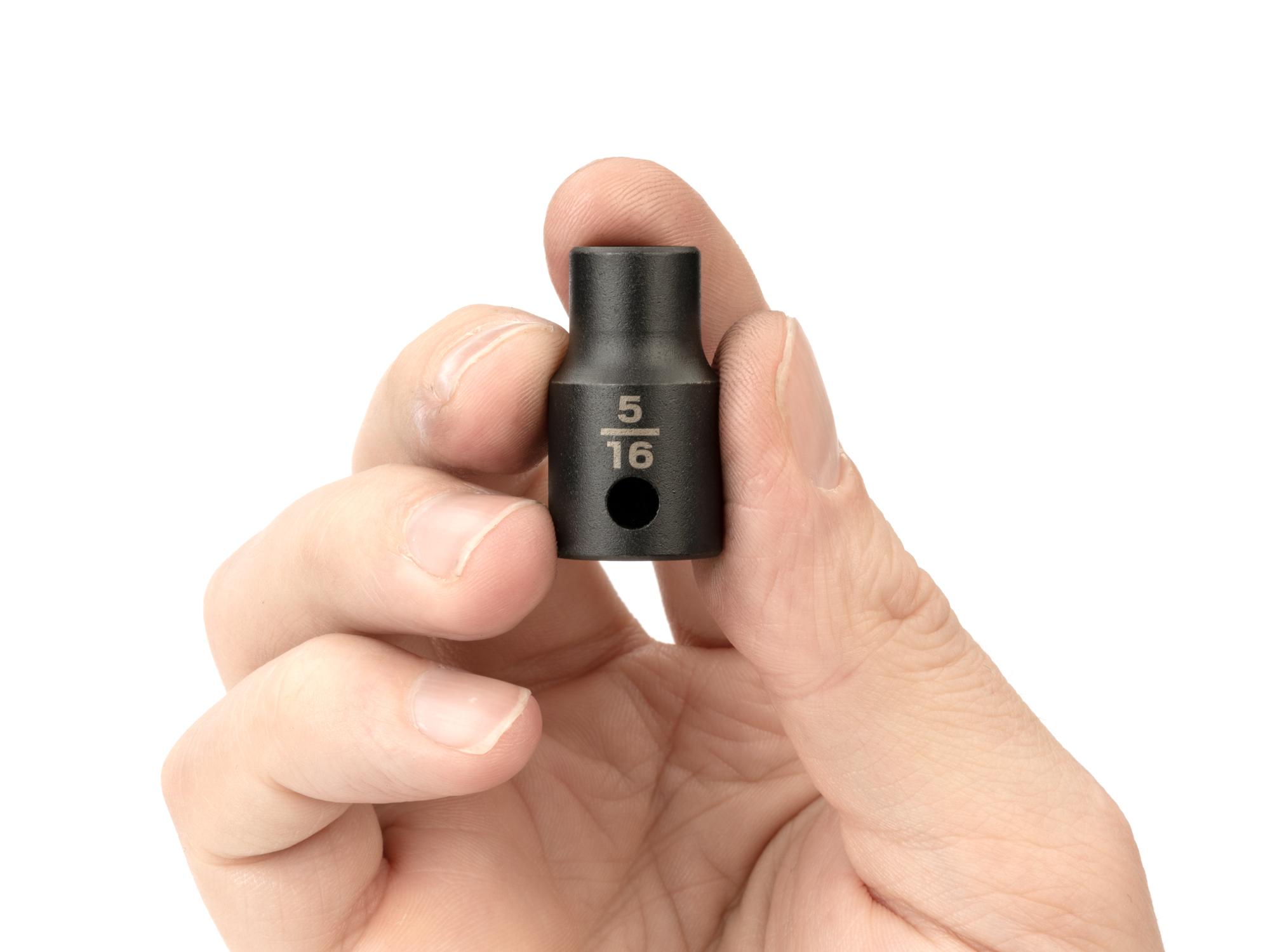 Person holding Tekton impact drive 6-point socket. Item #SID12008