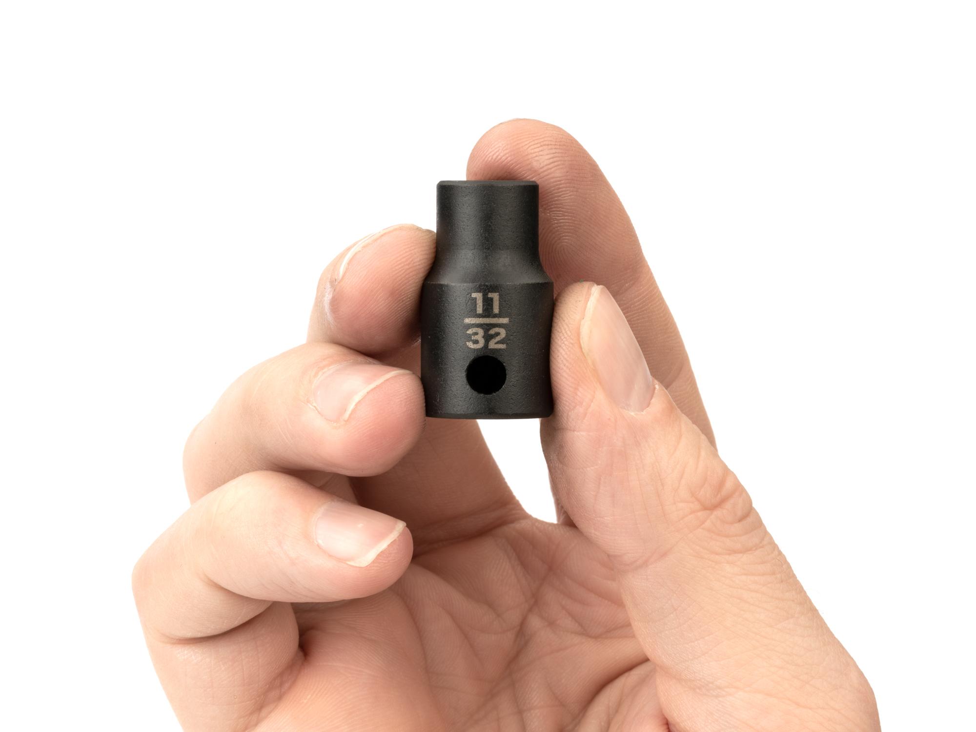 Person holding Tekton impact drive 6-point socket. Item #SID12009