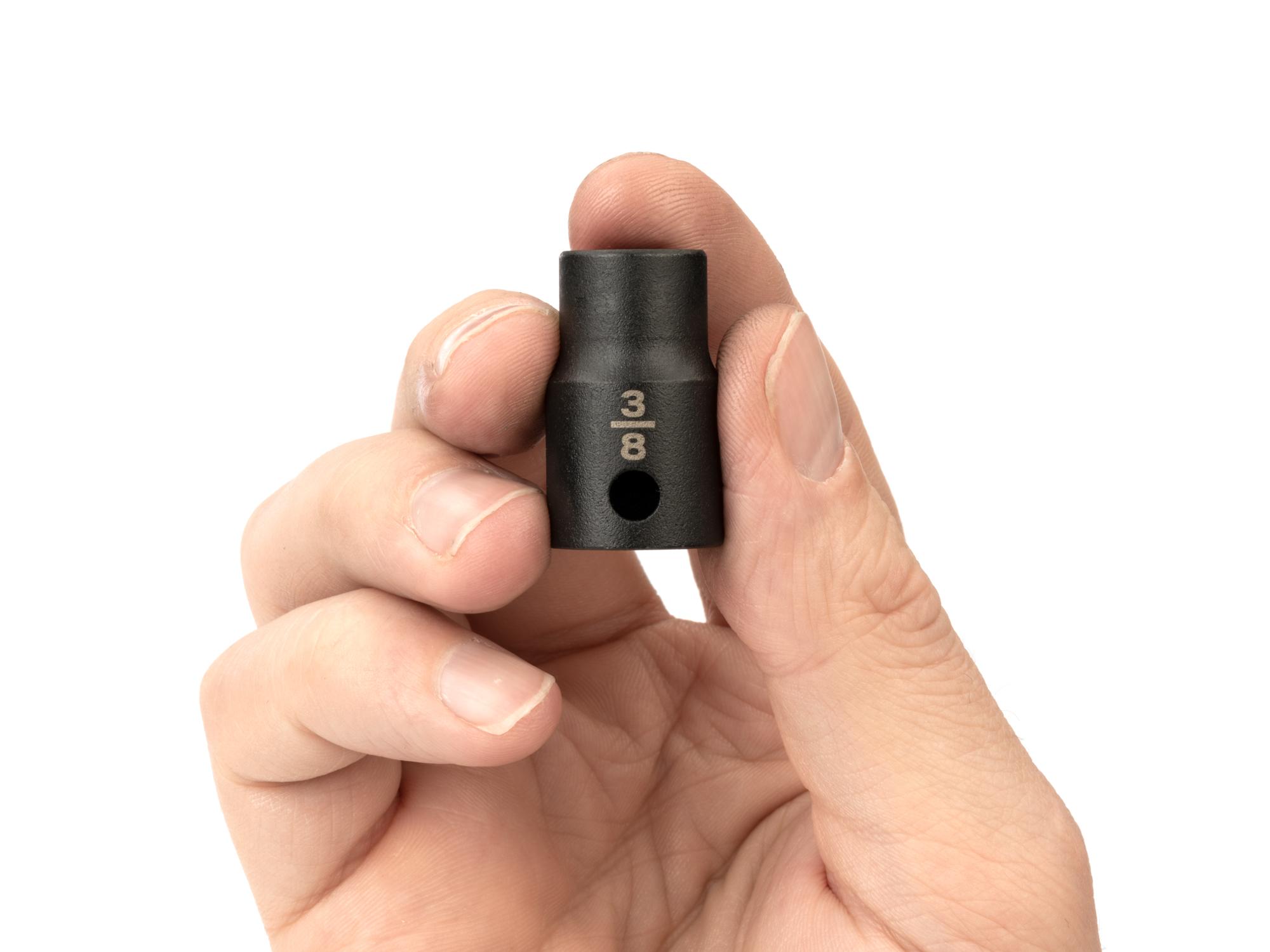 Person holding Tekton impact drive 6-point socket. Item #SID12010