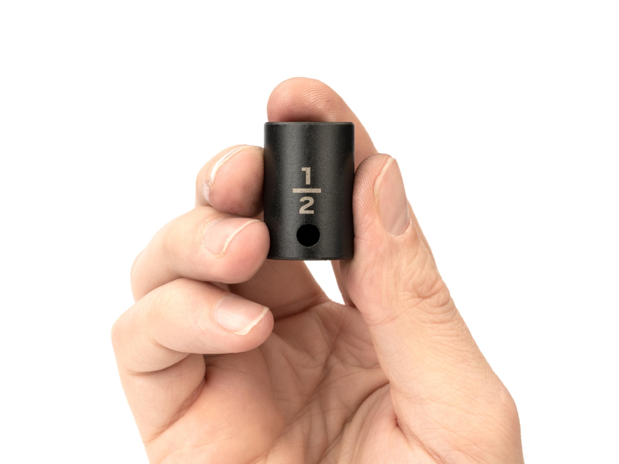 Person holding Tekton impact drive 6-point socket. Item #SID12013