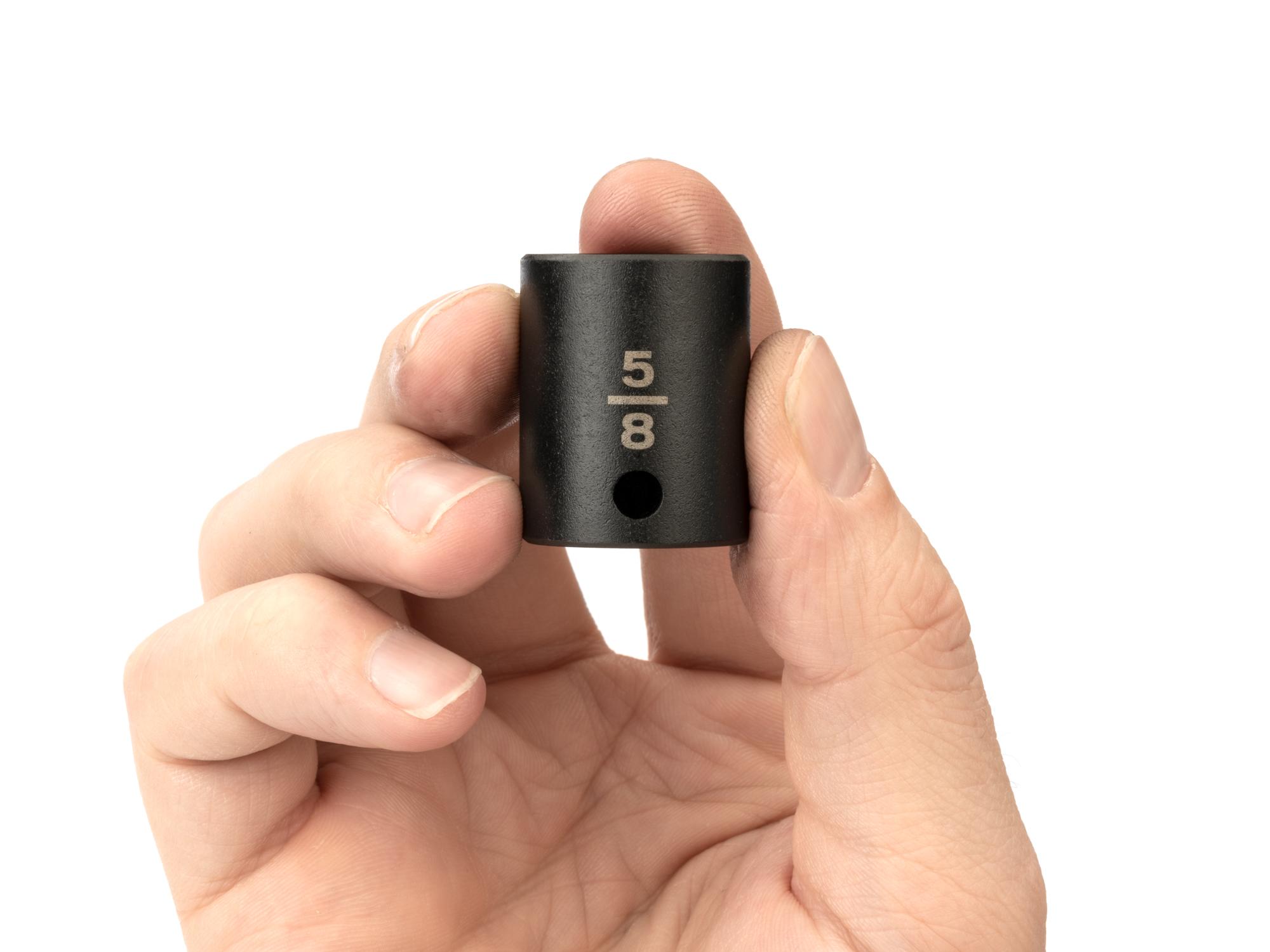 Person holding Tekton impact drive 6-point socket. Item #SID12016