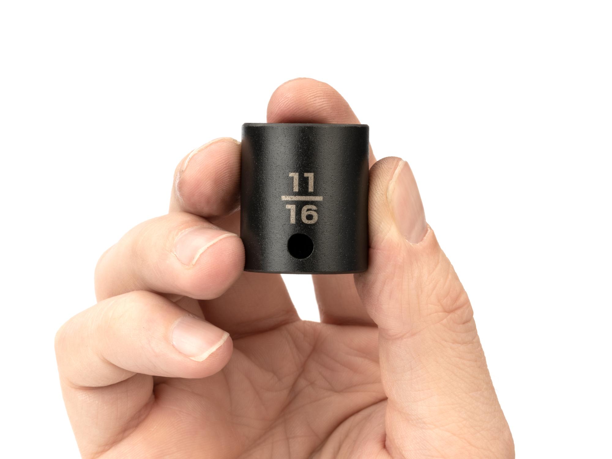 Person holding Tekton impact drive 6-point socket. Item #SID12017
