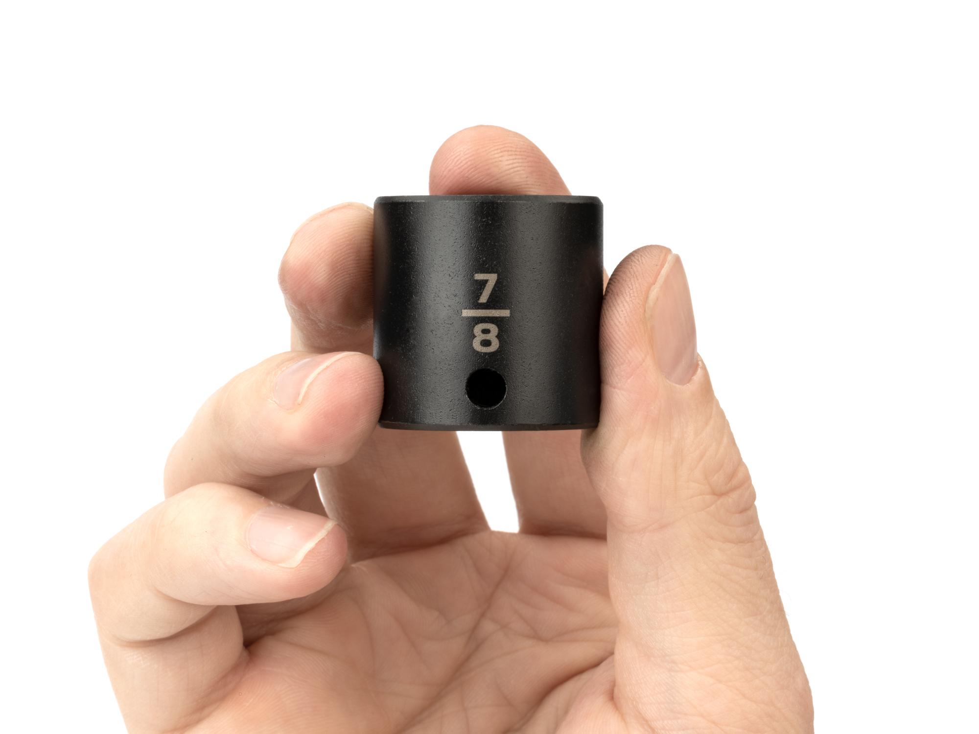 Person holding Tekton impact drive 6-point socket. Item #SID12022