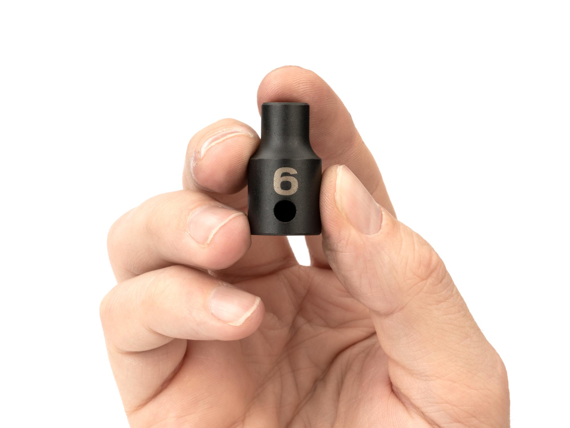 Person holding Tekton impact drive 6-point socket. Item #SID12106