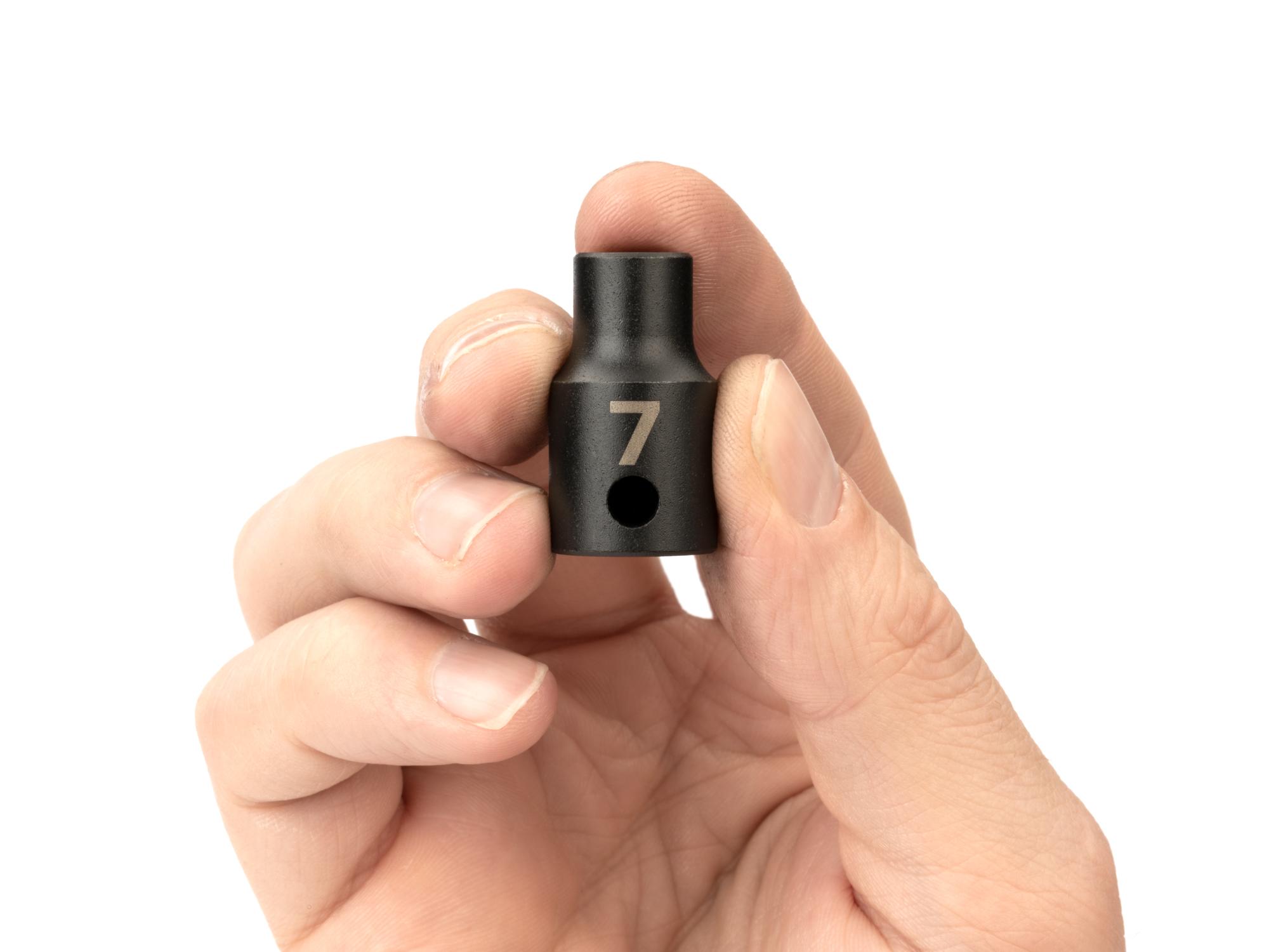 Person holding Tekton impact drive 6-point socket. Item #SID12107