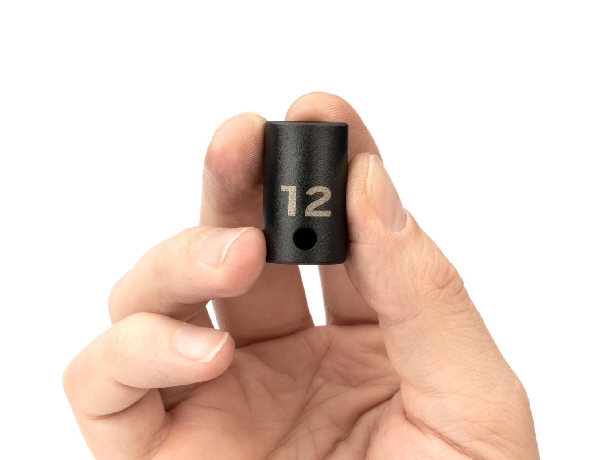 Person holding Tekton impact drive 6-point socket. Item #SID12112