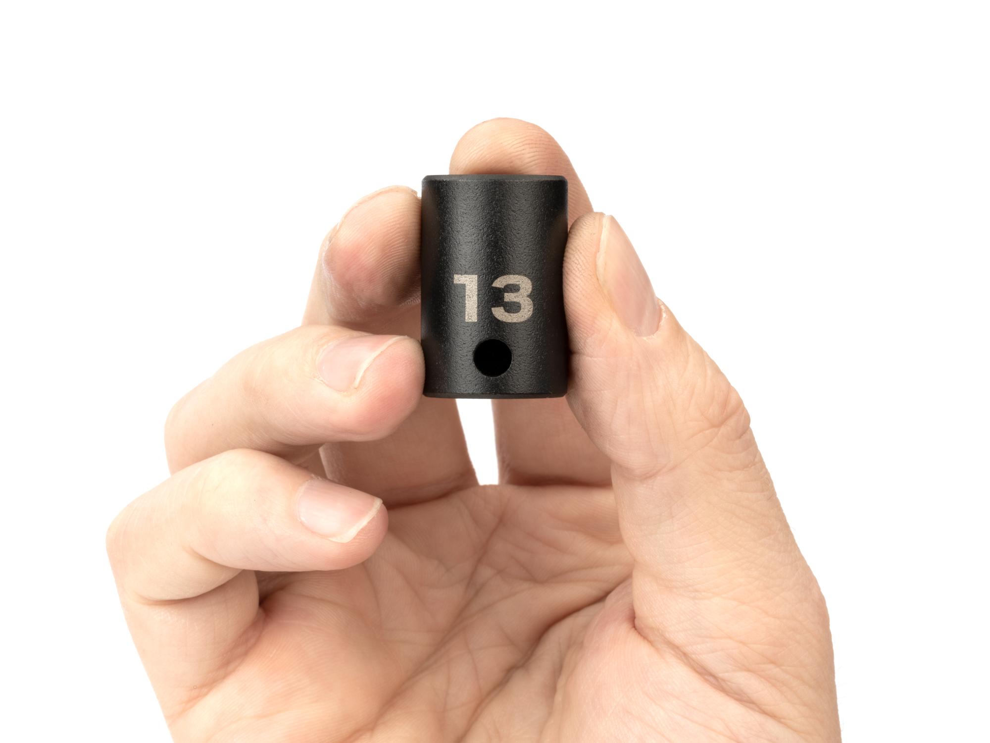 Person holding Tekton impact drive 6-point socket. Item #SID12113