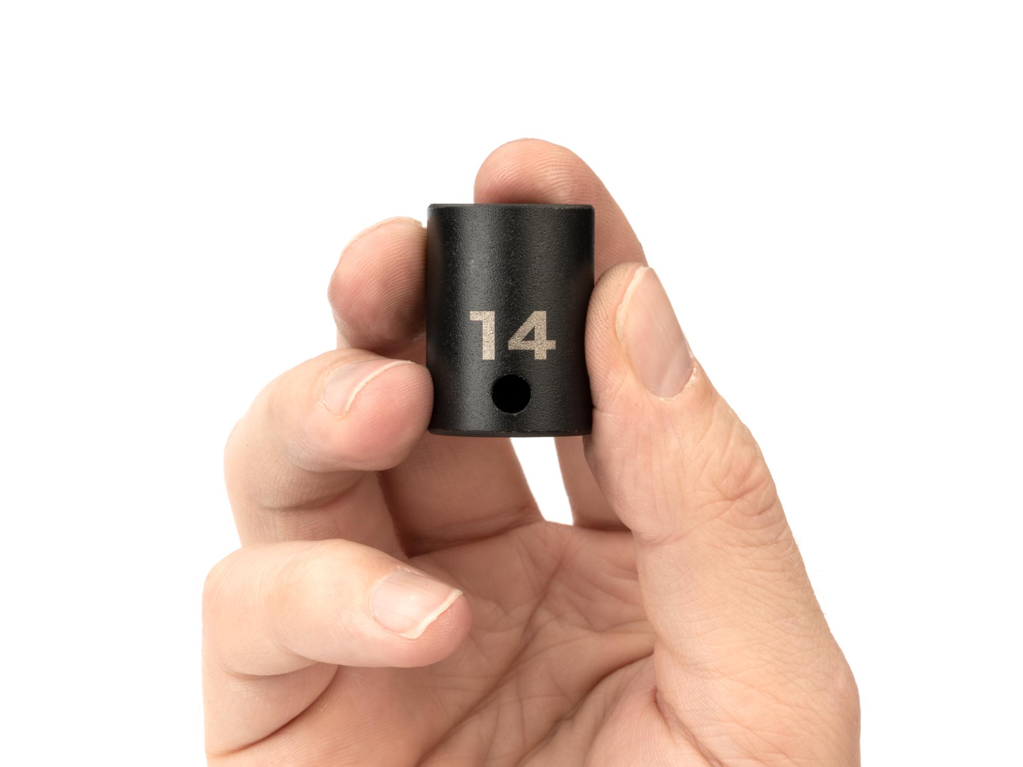 Person holding Tekton impact drive 6-point socket. Item #SID12114