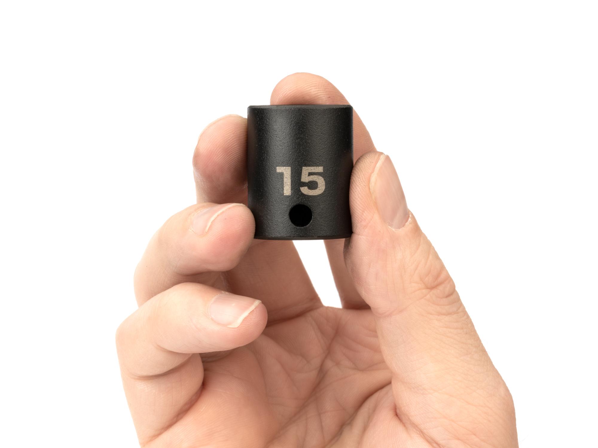 Person holding Tekton impact drive 6-point socket. Item #SID12115