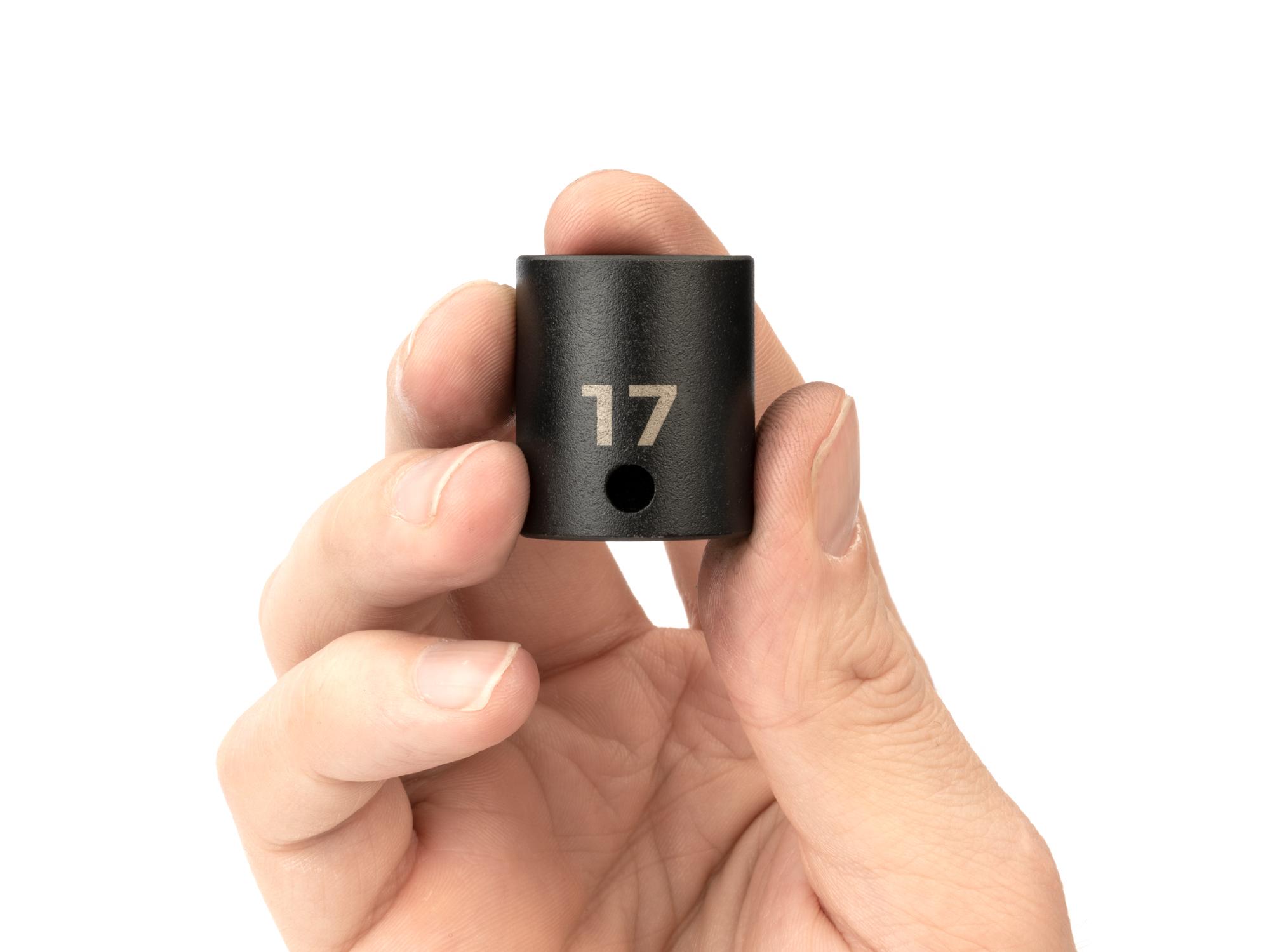 Person holding Tekton impact drive 6-point socket. Item #SID12117