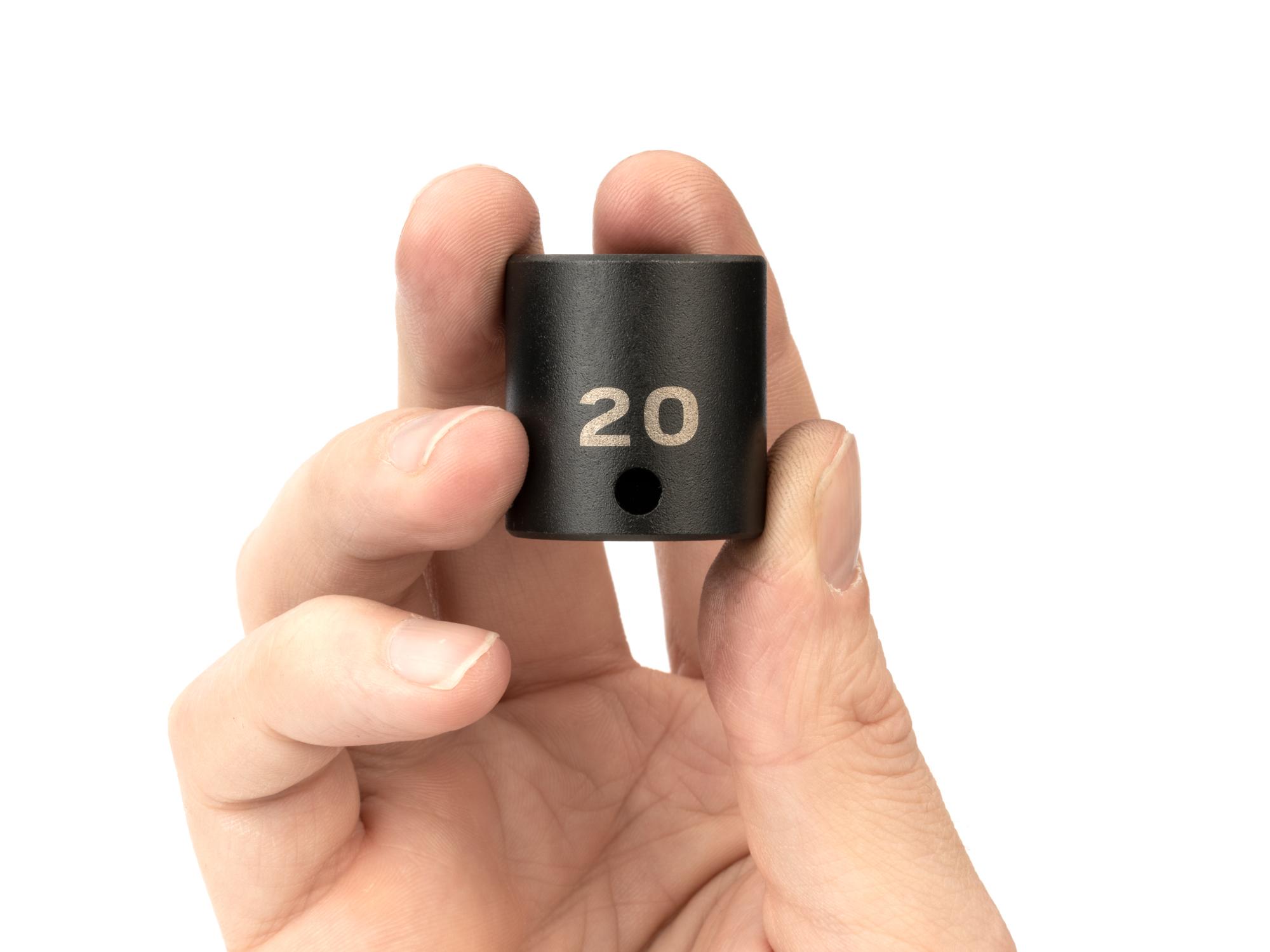 Person holding Tekton impact drive 6-point socket. Item #SID12120