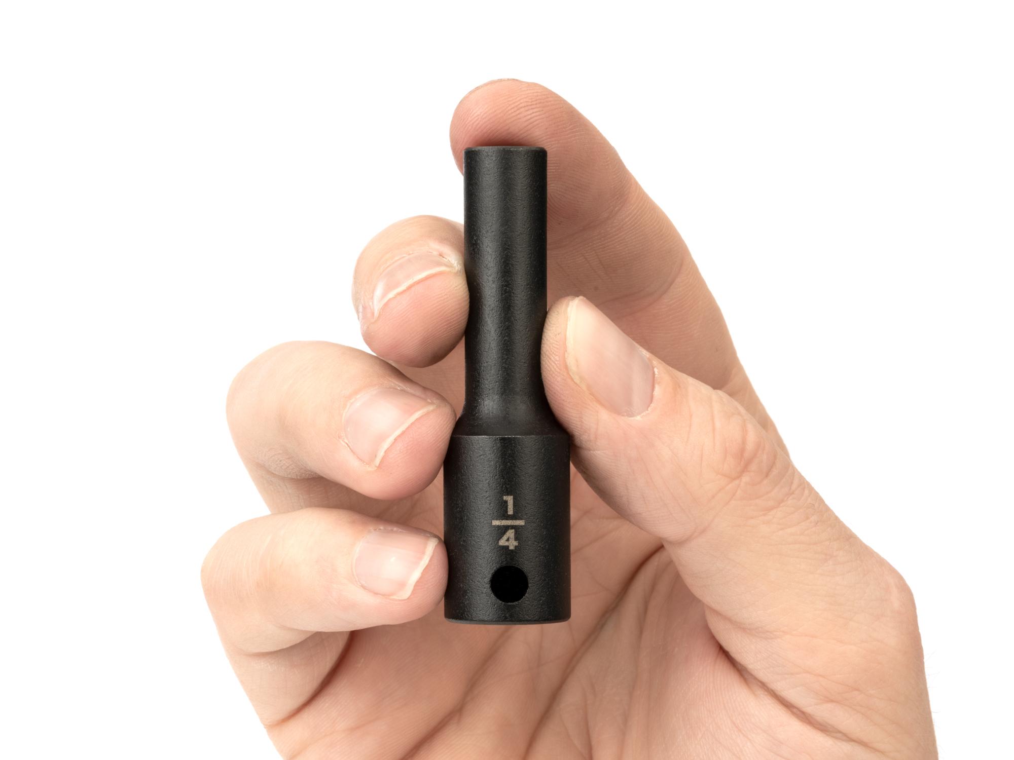 Person holding Tekton impact drive 6-point socket. Item #SID13006