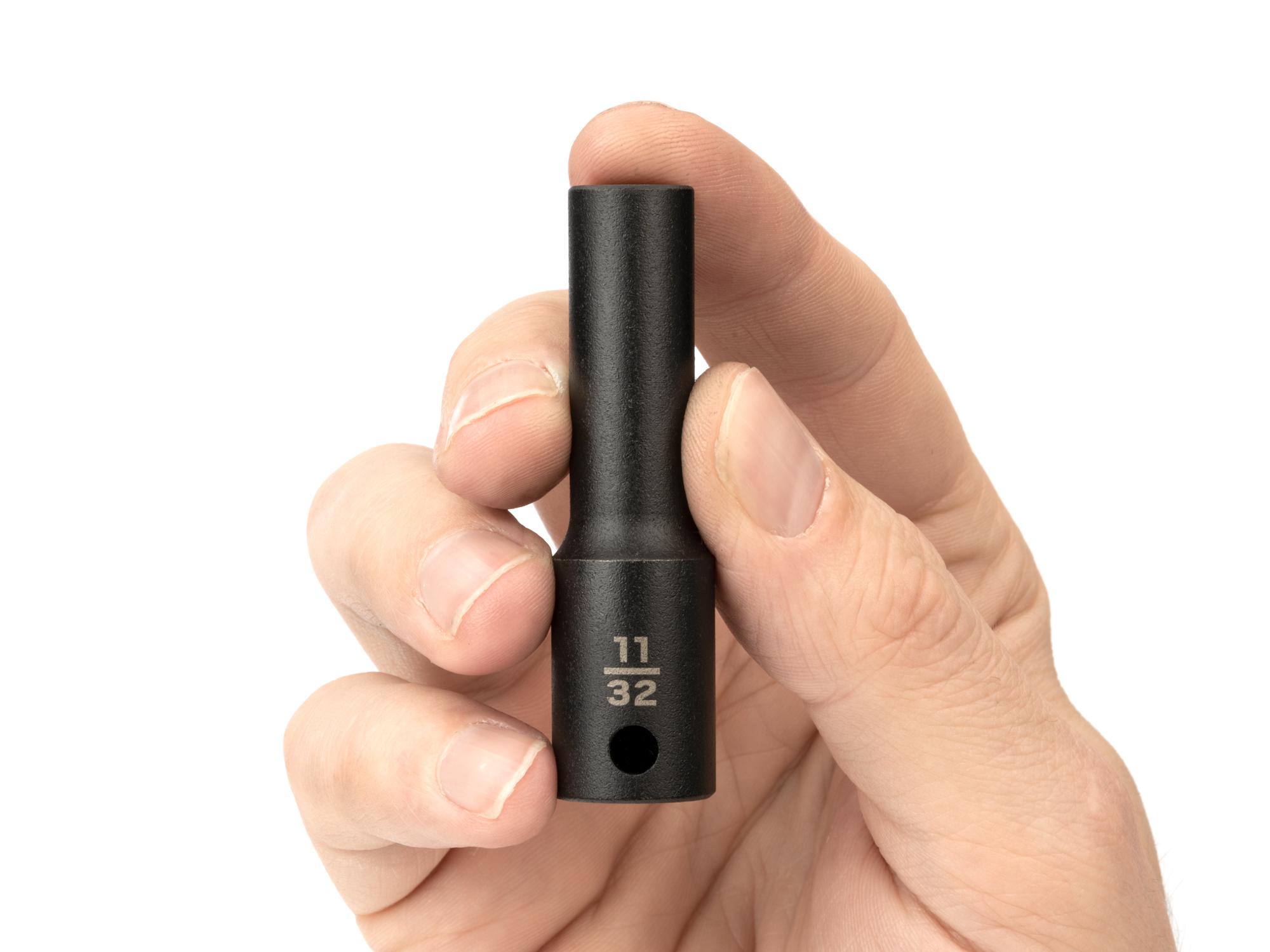 Person holding Tekton impact drive 6-point socket. Item #SID13009