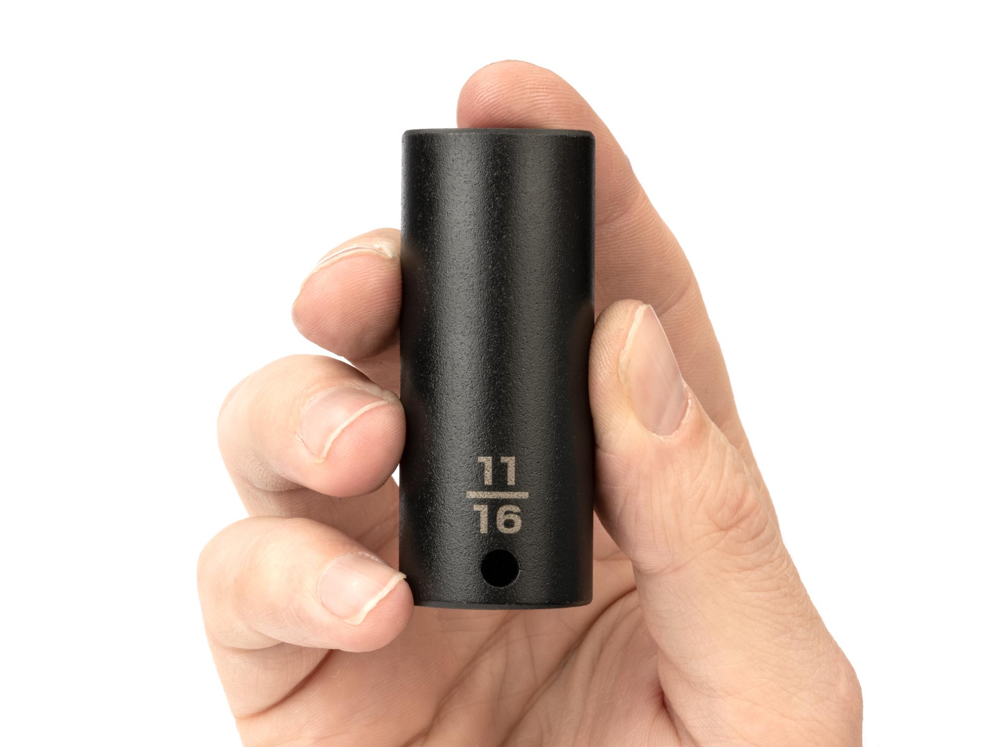 Person holding Tekton impact drive 6-point socket. Item #SID13017