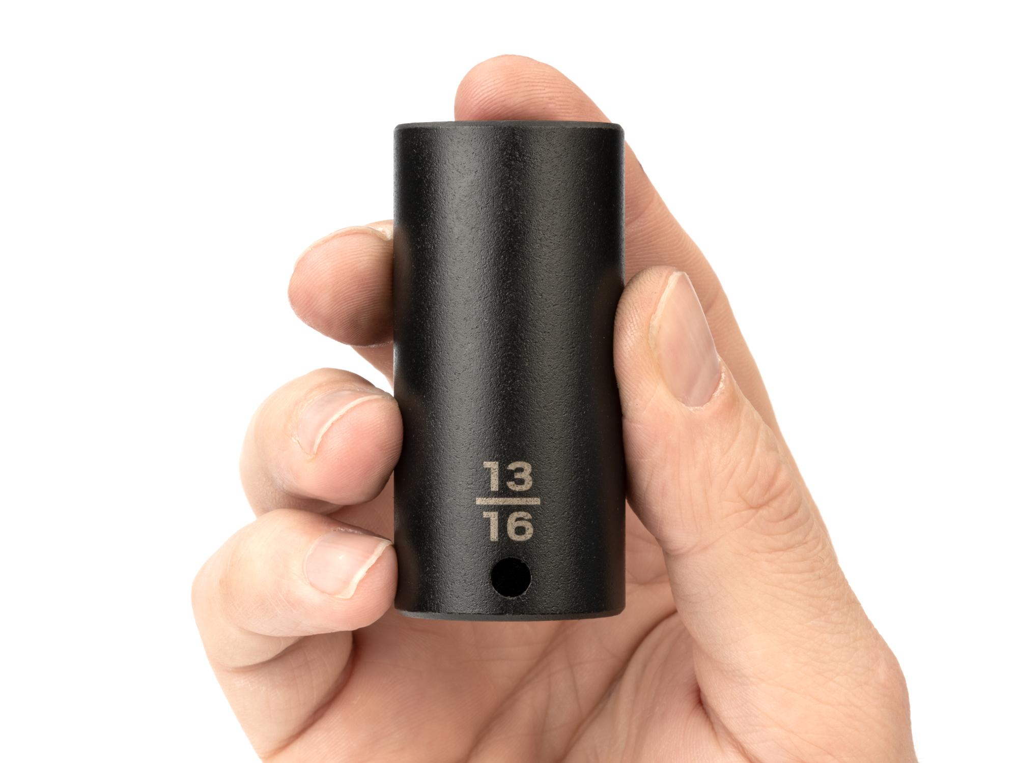 Person holding Tekton impact drive 6-point socket. Item #SID13021