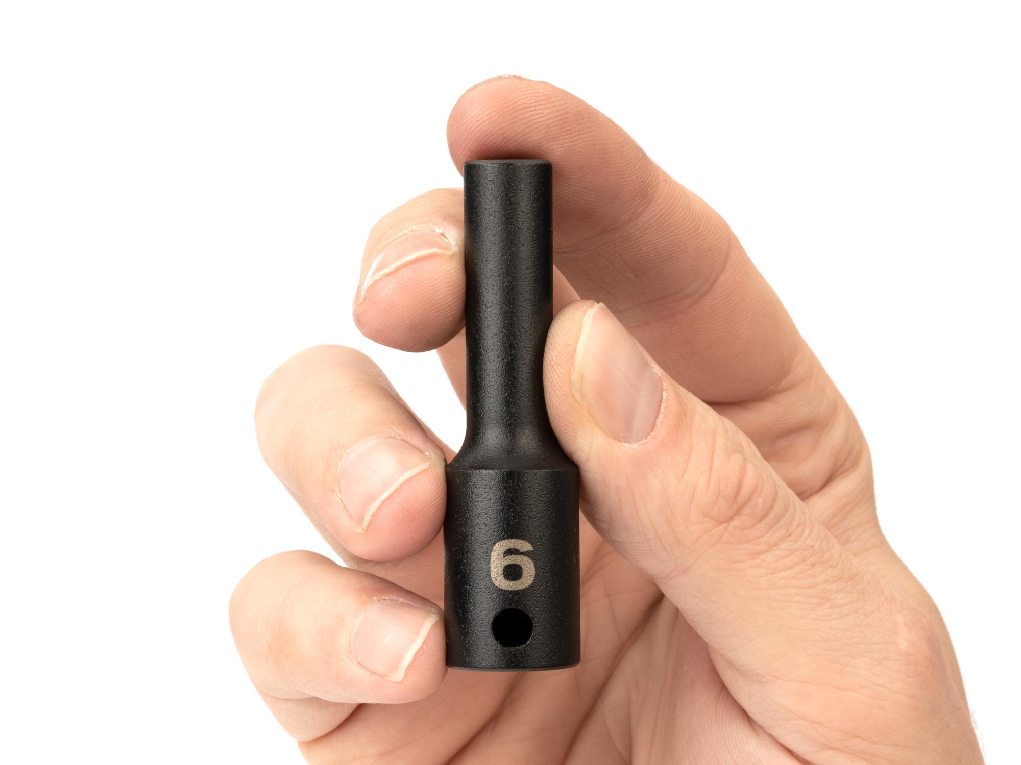 Person holding Tekton impact drive 6-point socket. Item #SID13106