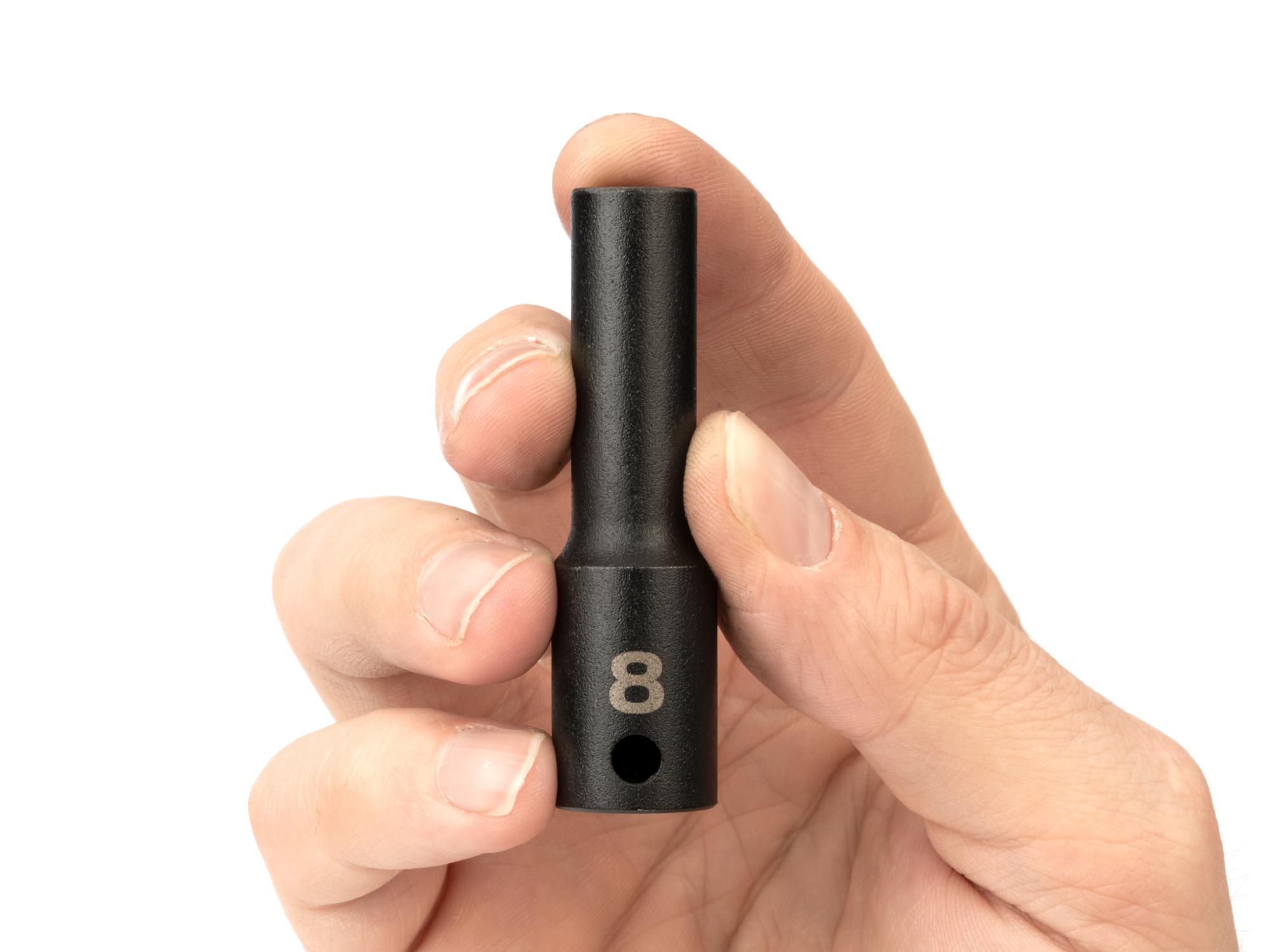 Person holding Tekton impact drive 6-point socket. Item #SID13108