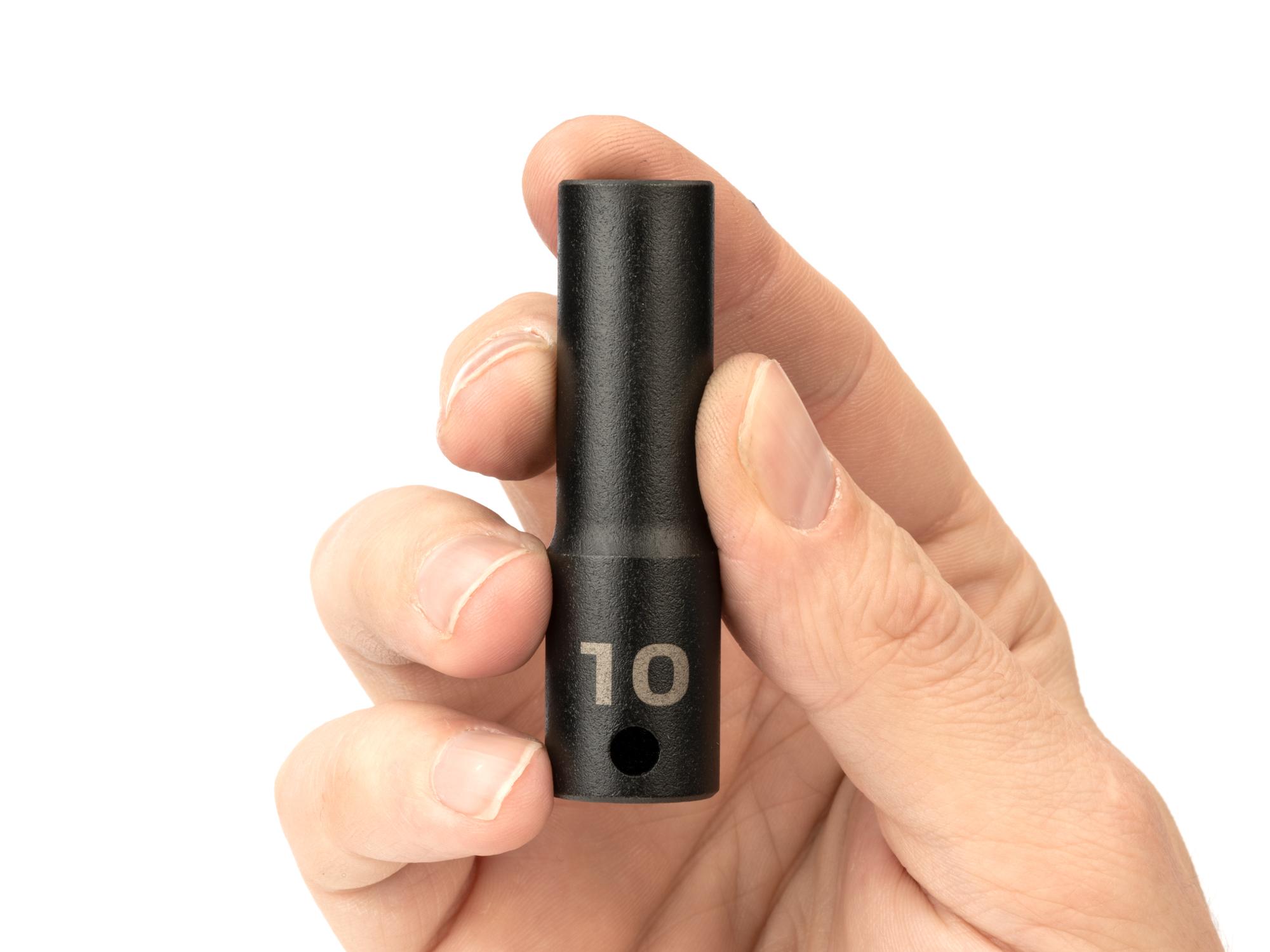 Person holding Tekton impact drive 6-point socket. Item #SID13110