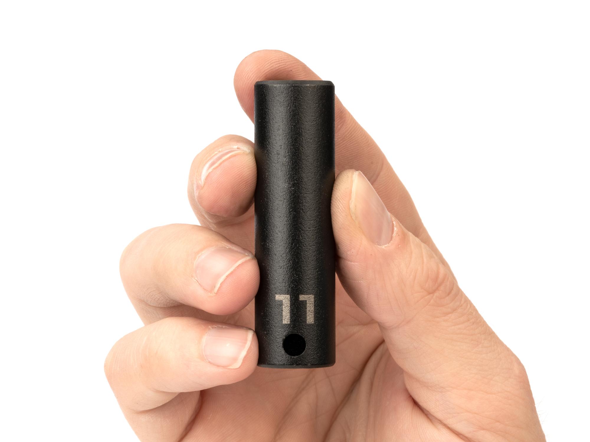 Person holding Tekton impact drive 6-point socket. Item #SID13111